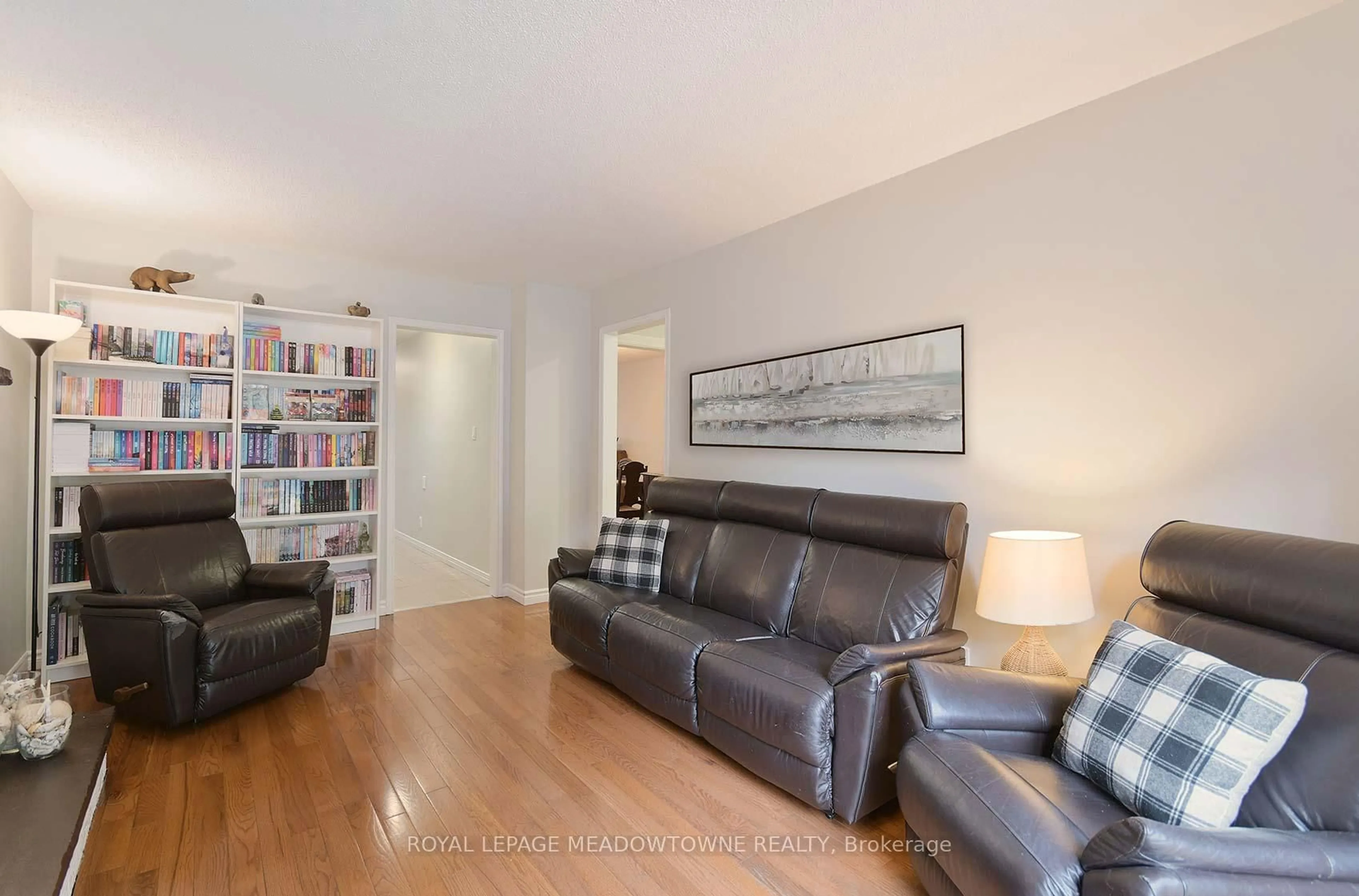 Living room with furniture, wood/laminate floor for 2374 Hargood Pl, Mississauga Ontario L5M 3G2