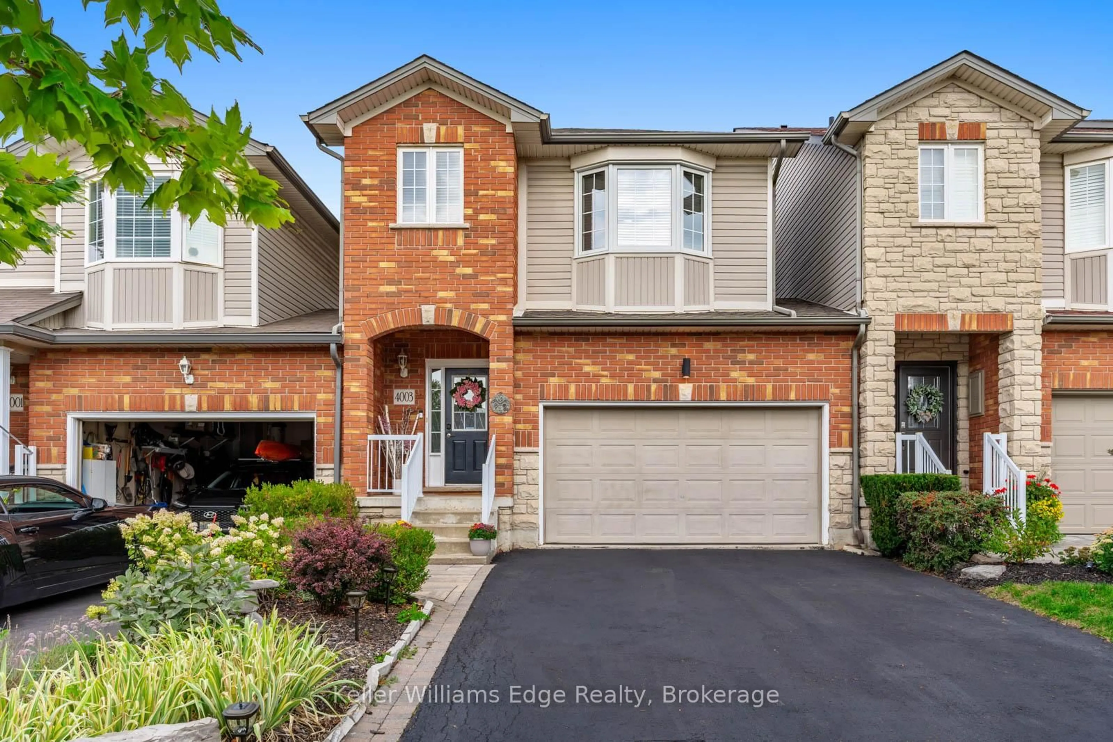 Home with brick exterior material, street for 4003 Medland Dr, Burlington Ontario L7M 4W7