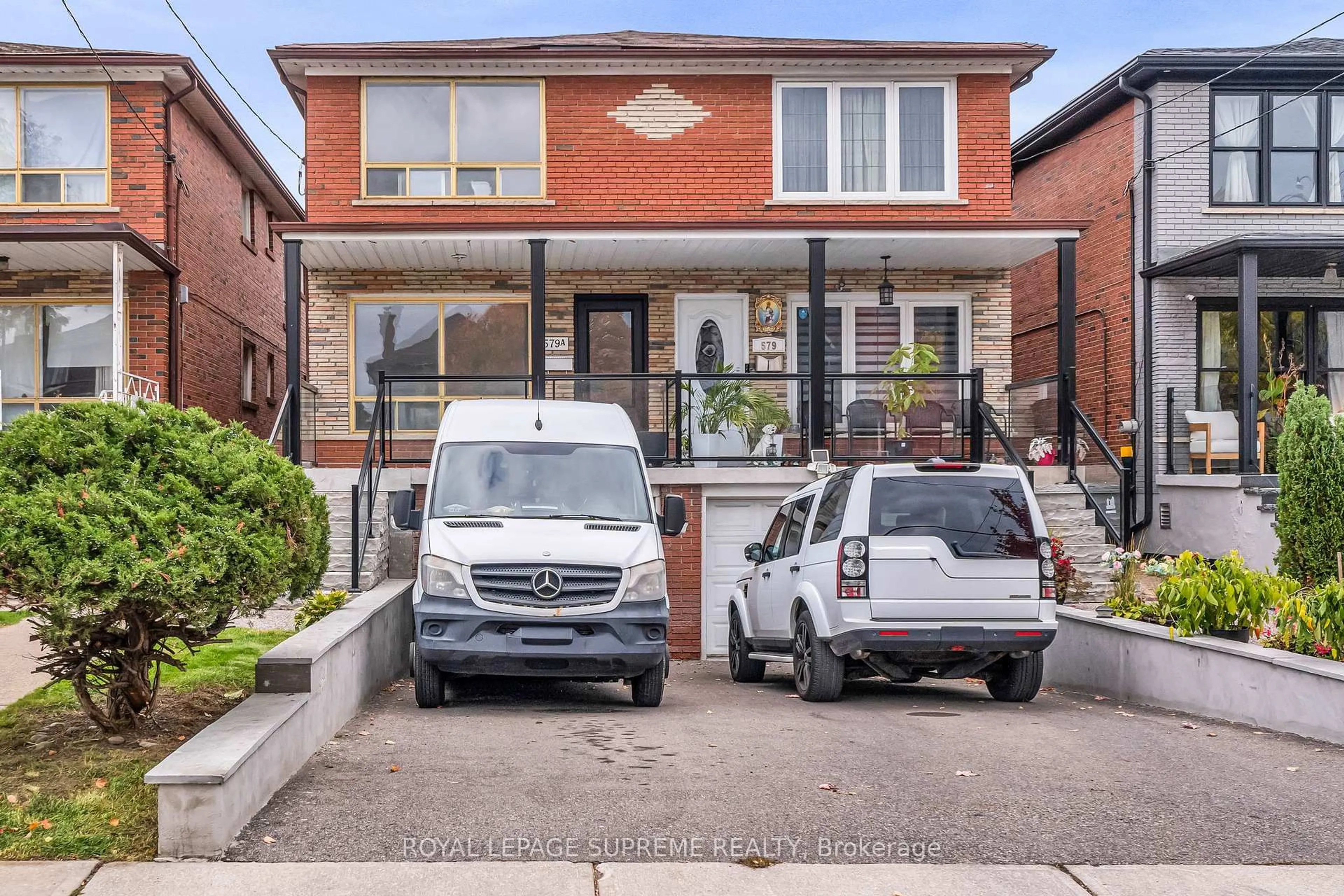 Home with brick exterior material, street for 579A Delaware Ave, Toronto Ontario M6H 5V3