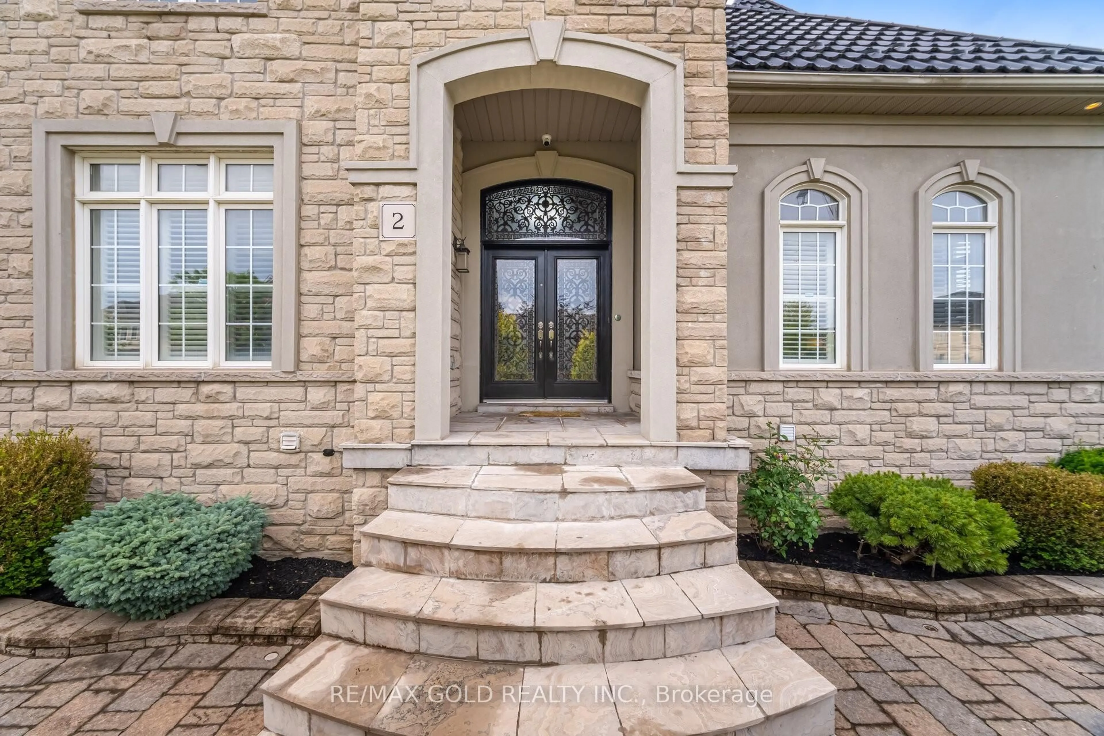 Home with brick exterior material, street for 2 Belleville Dr, Brampton Ontario L6P 1V7