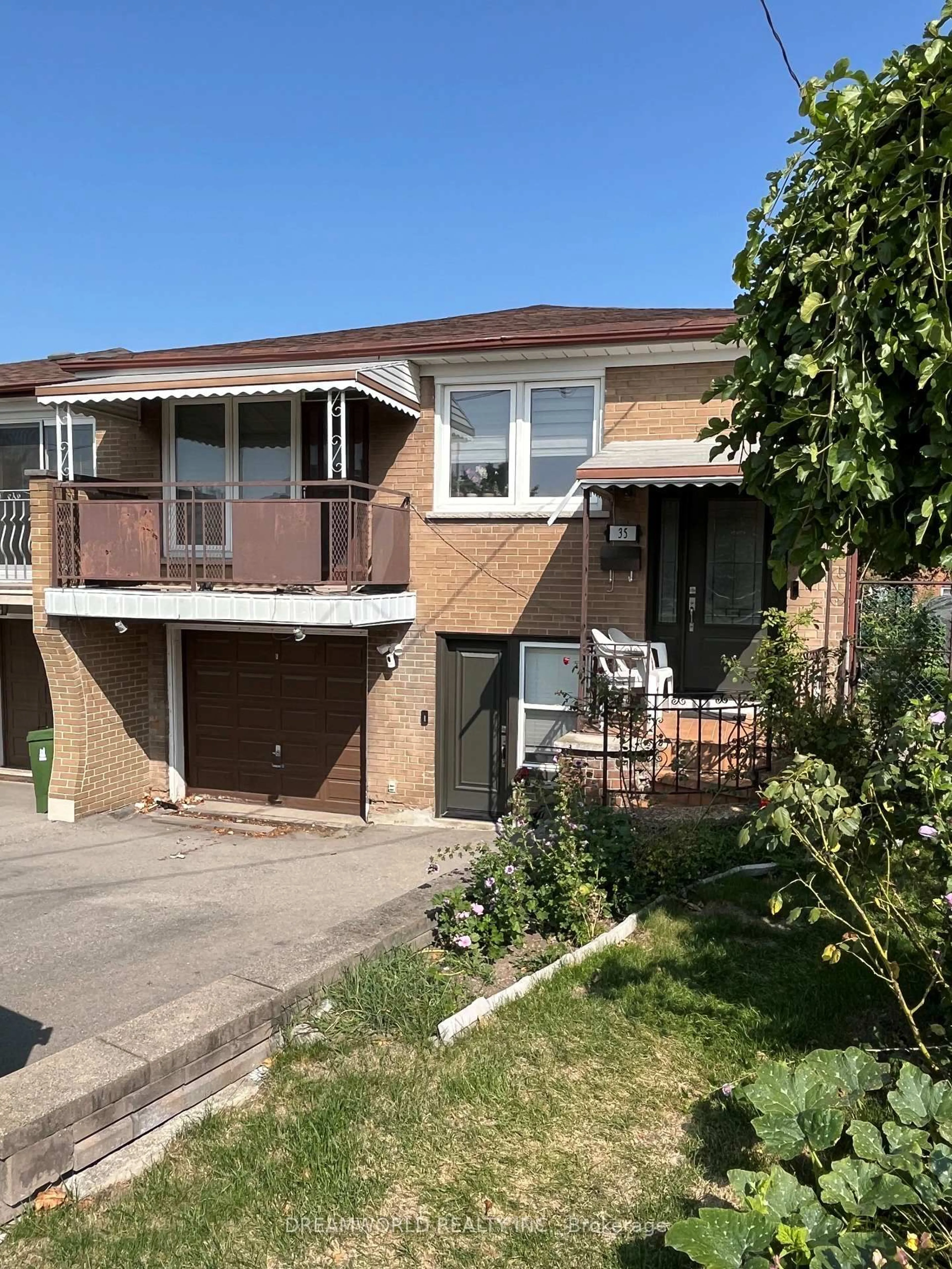 Home with brick exterior material, street for 35 Cobb Ave, Toronto Ontario M3L 2A2