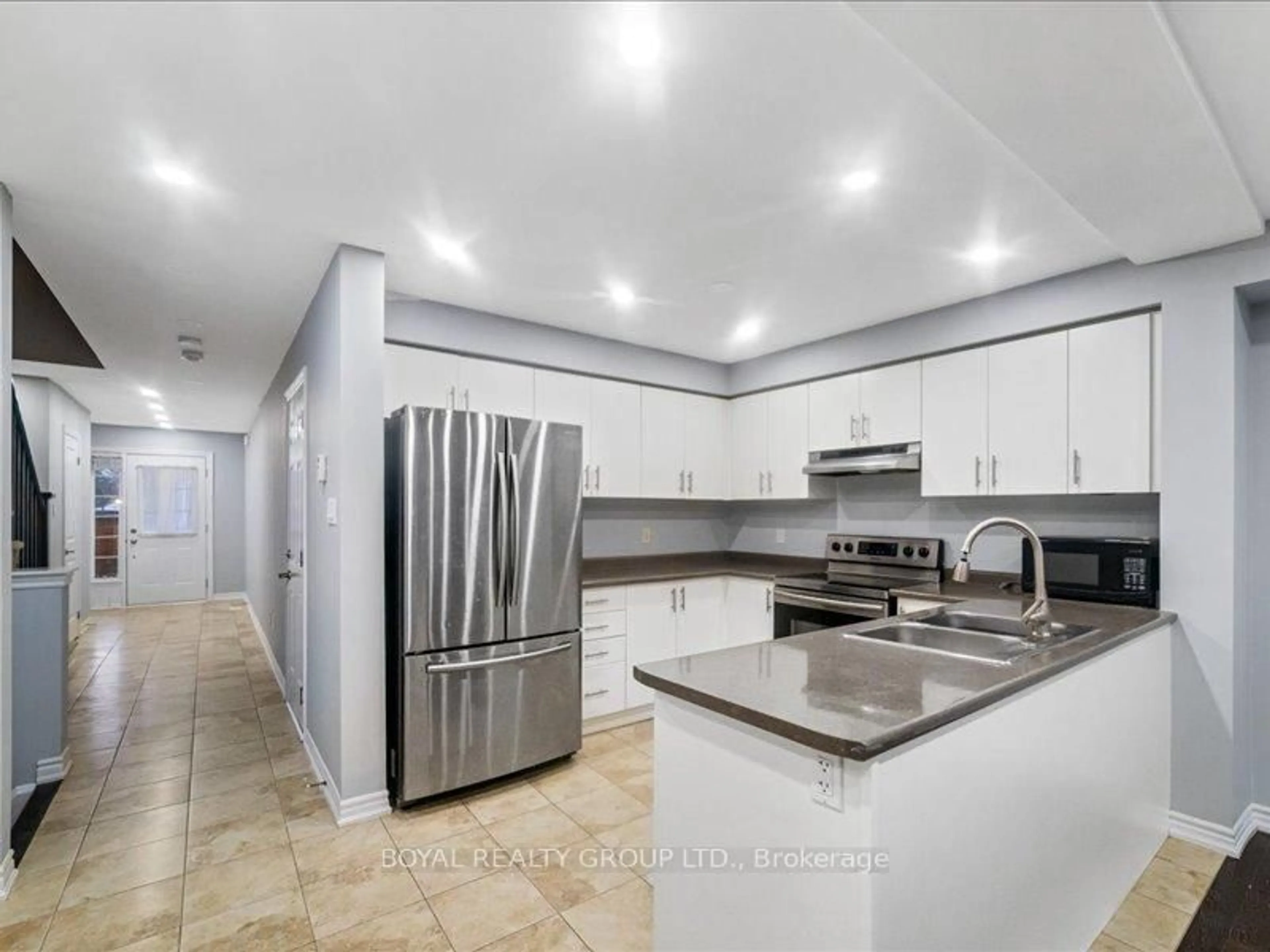 Open concept kitchen, ceramic/tile floor for 48 C Line #104, Orangeville Ontario L9W 6X9