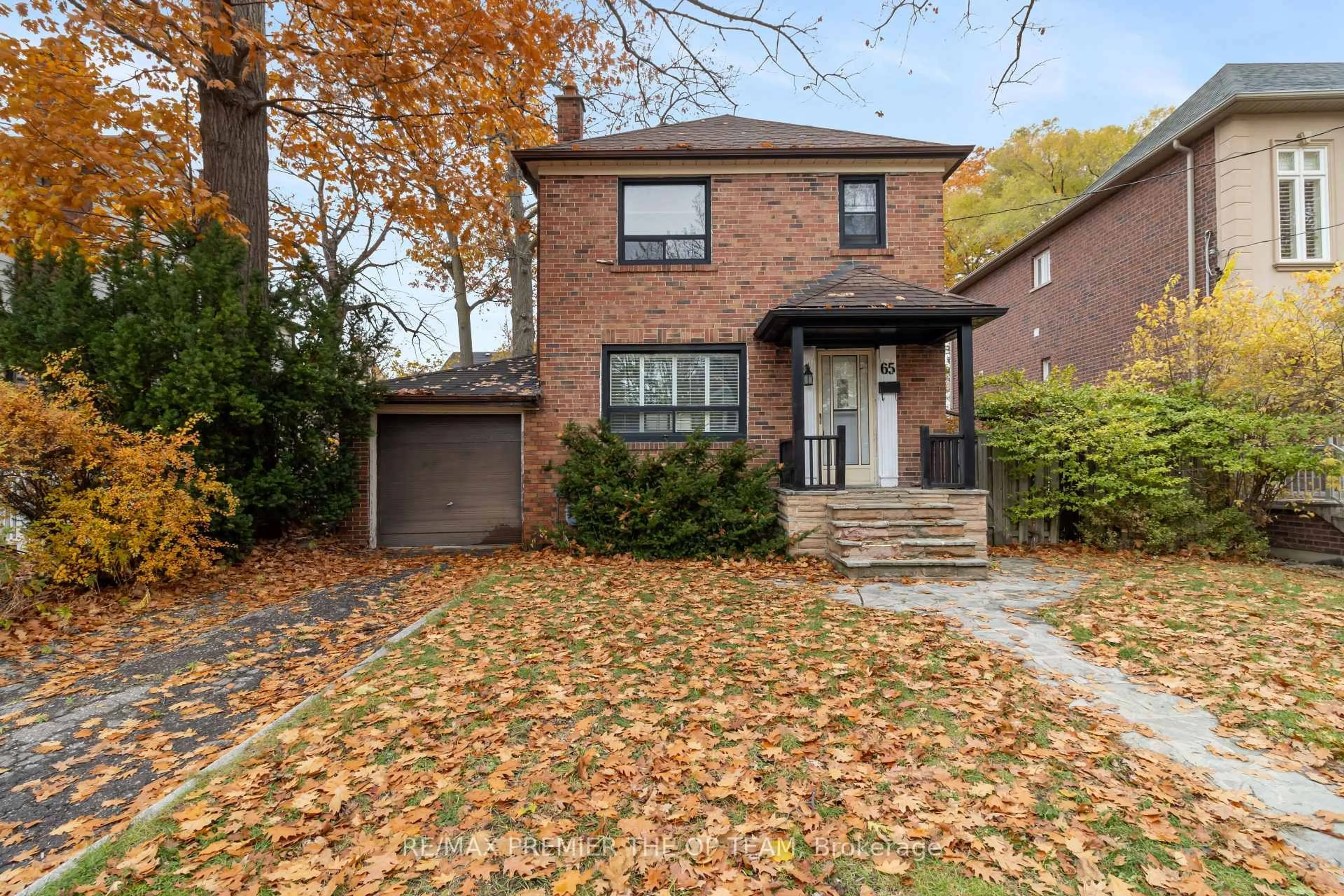 Home with brick exterior material, street for 65 Long Branch Ave, Toronto Ontario M8W 3J3