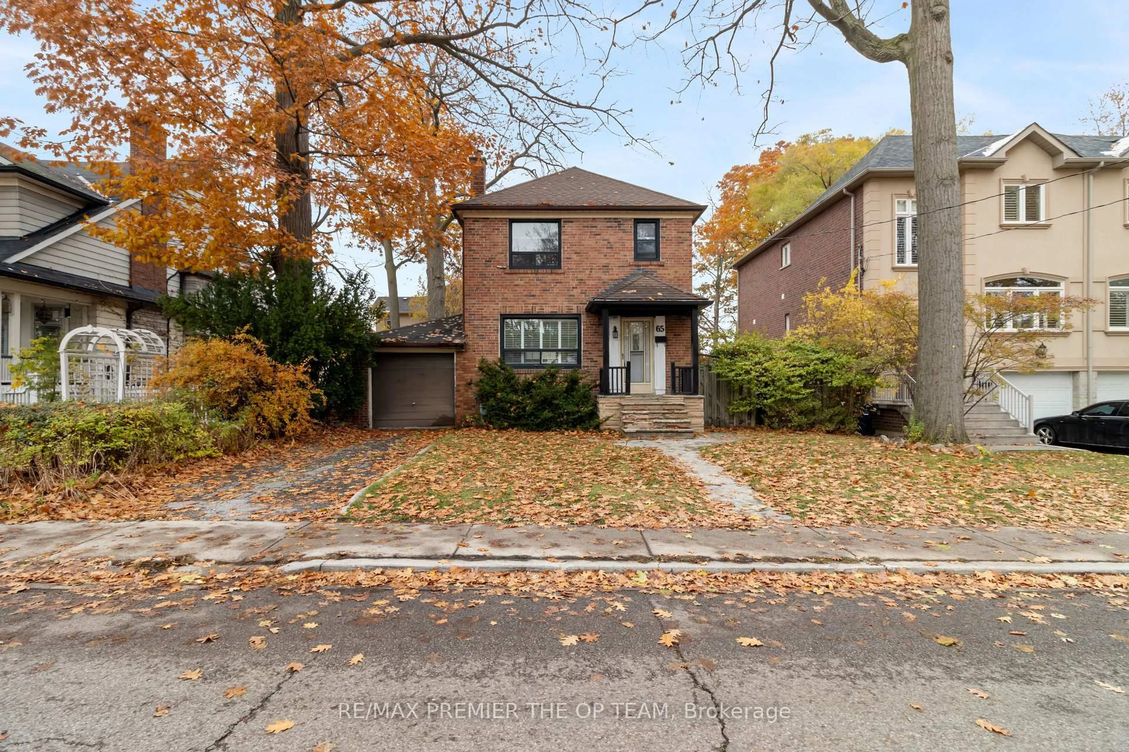 Home with brick exterior material, street for 65 Long Branch Ave, Toronto Ontario M8W 3J3
