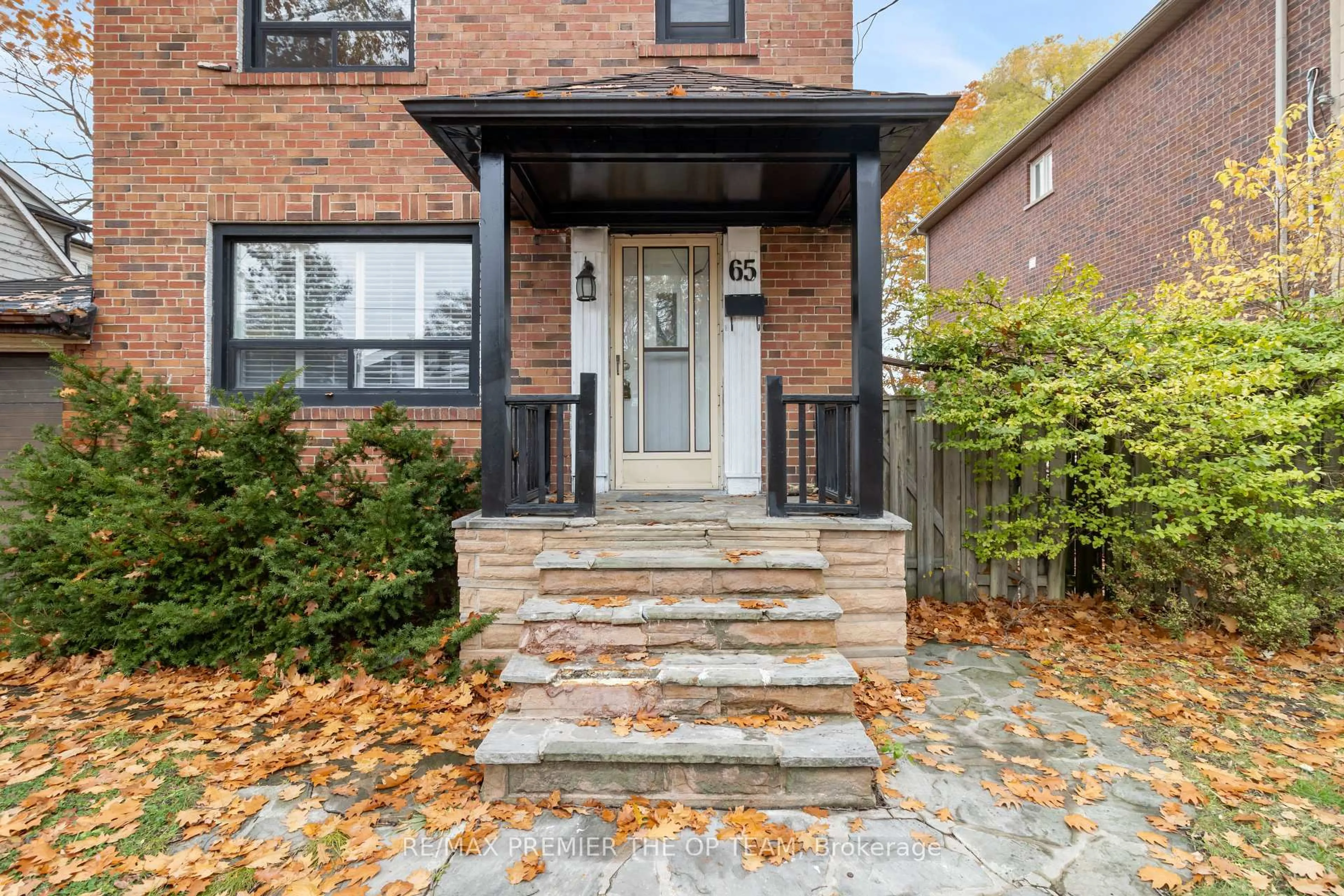 Home with brick exterior material, street for 65 Long Branch Ave, Toronto Ontario M8W 3J3