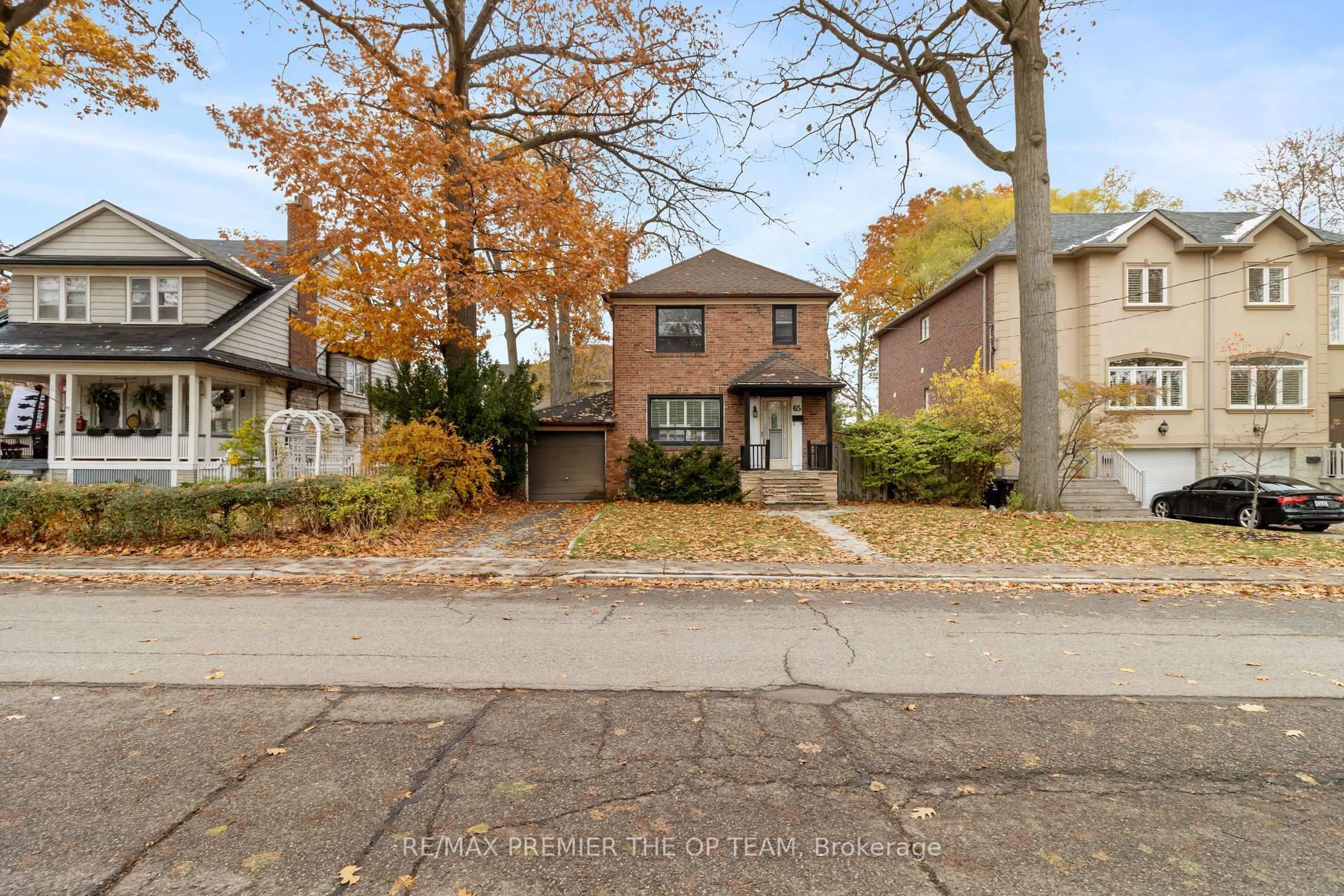Home with brick exterior material, street for 65 Long Branch Ave, Toronto Ontario M8W 3J3