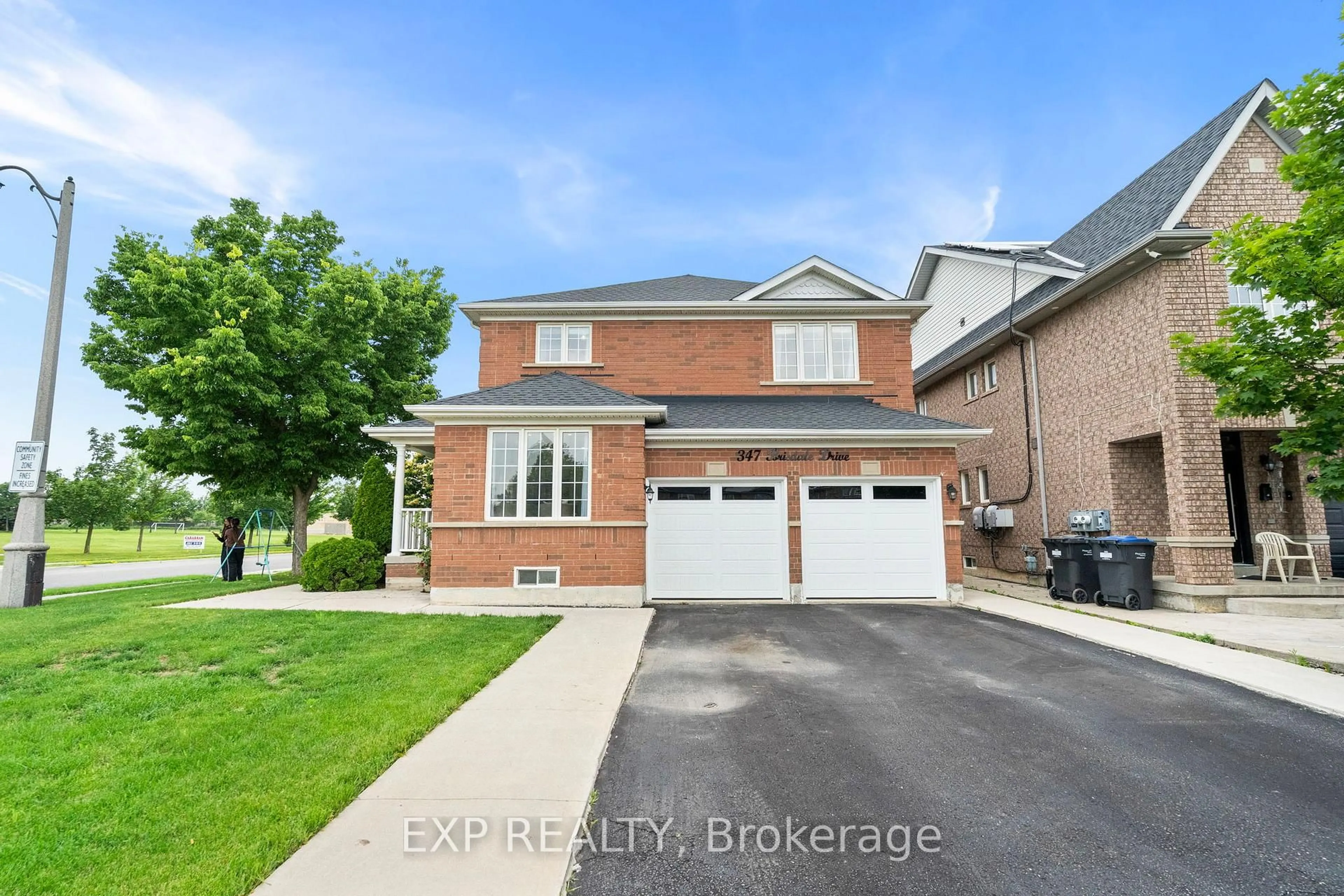 Home with brick exterior material, street for 347 Brisdale Dr, Brampton Ontario L7A 3M6