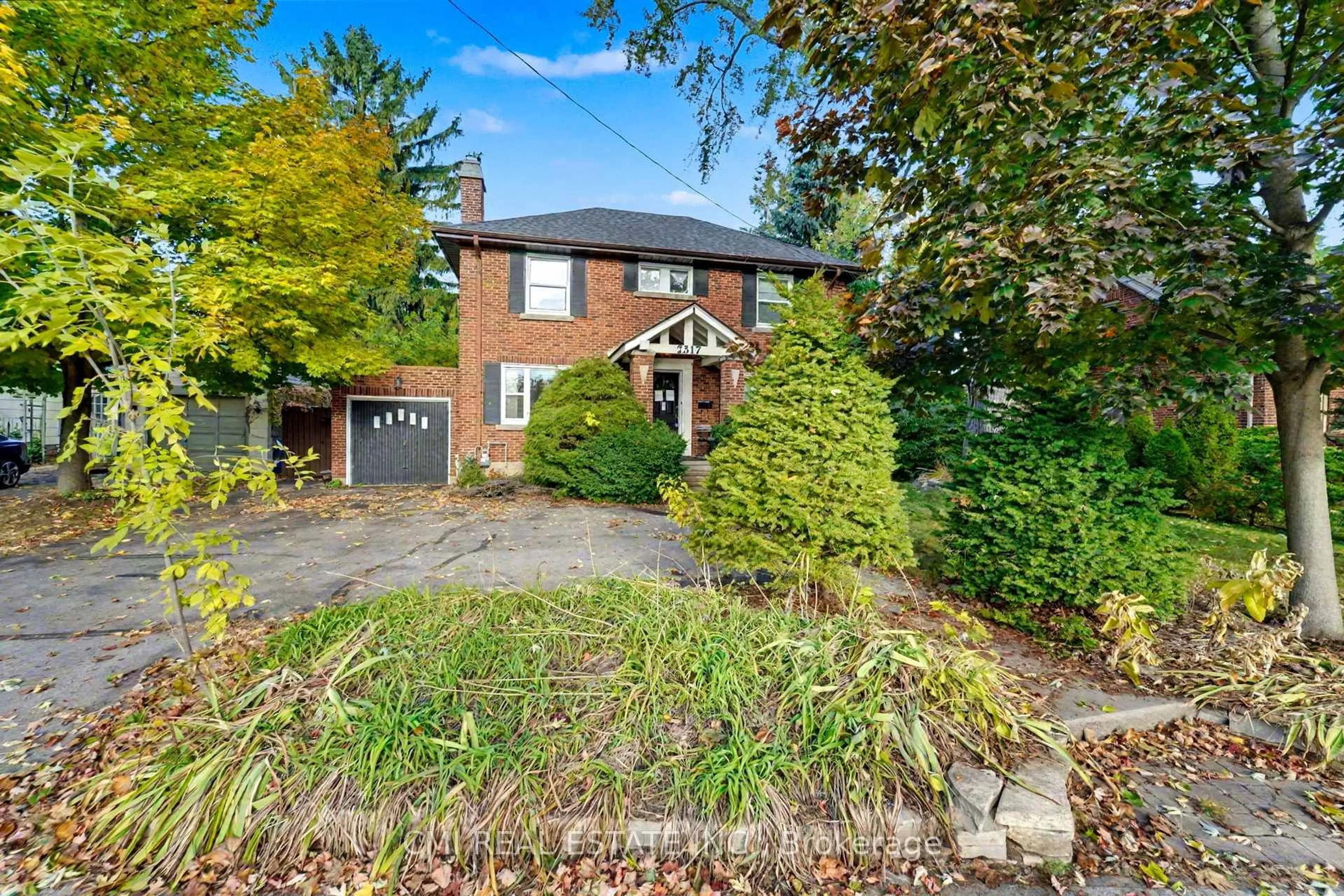 Home with brick exterior material, street for 2317 Lakeshore Rd, Burlington Ontario L7R 1B3