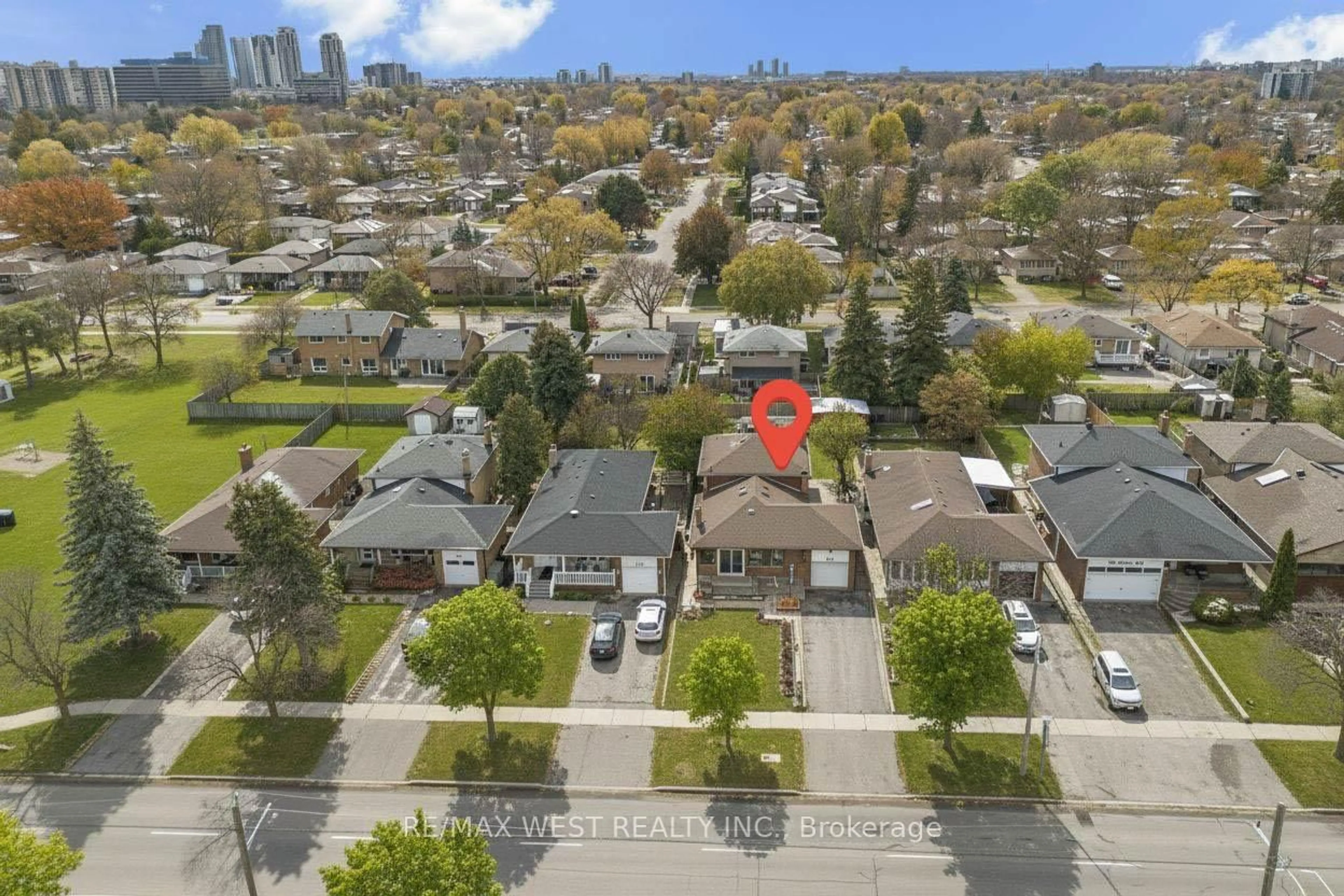 A pic from outside/outdoor area/front of a property/back of a property/a pic from drone, city buildings view from balcony for 485 Rathburn Rd, Toronto Ontario M9C 3S9
