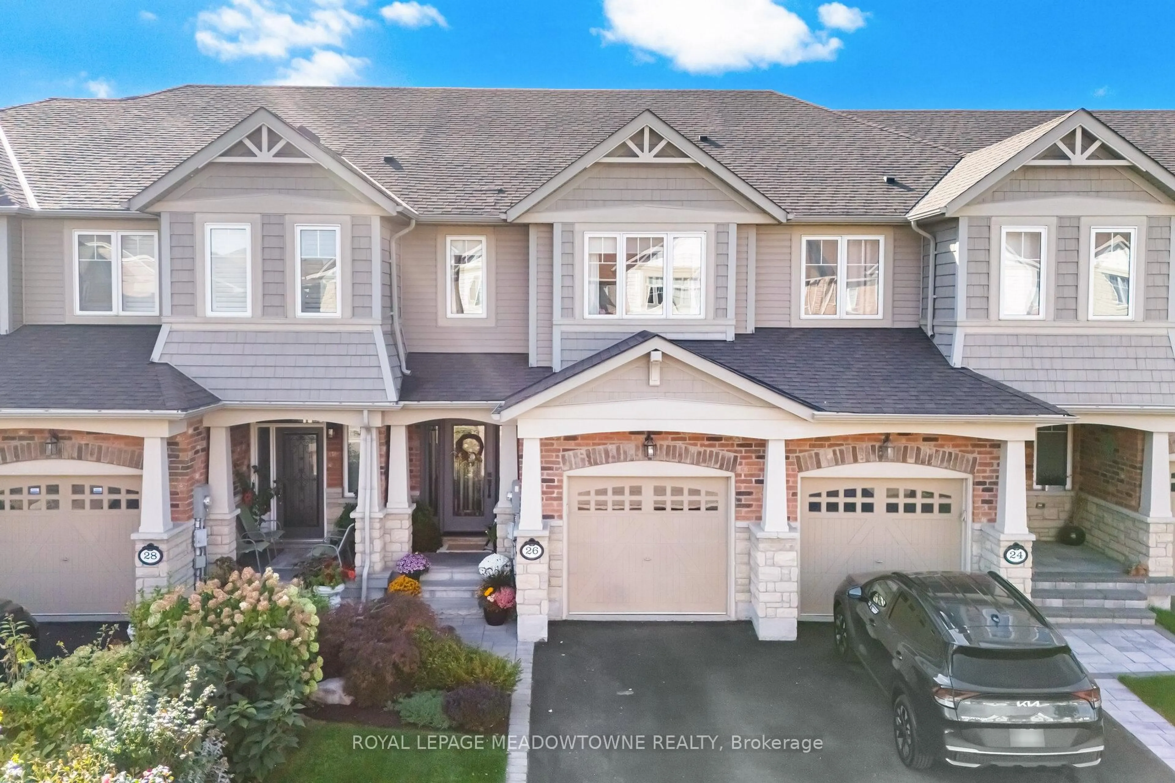 Home with vinyl exterior material, street for 26 Vinewood Rd, Caledon Ontario L7C 4A9