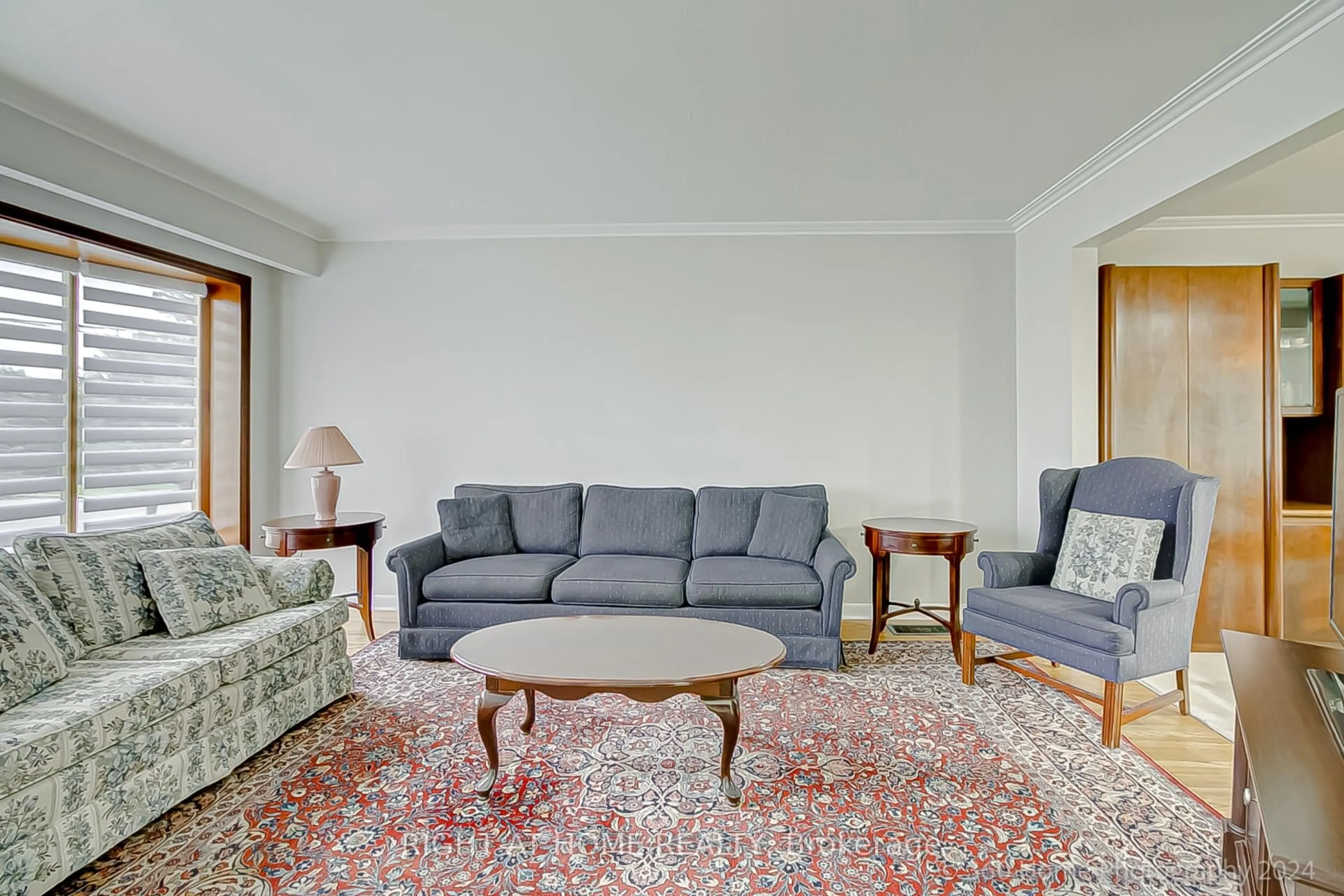 Living room with furniture, carpet floor for 19 Martini Dr, Toronto Ontario M6M 4X4