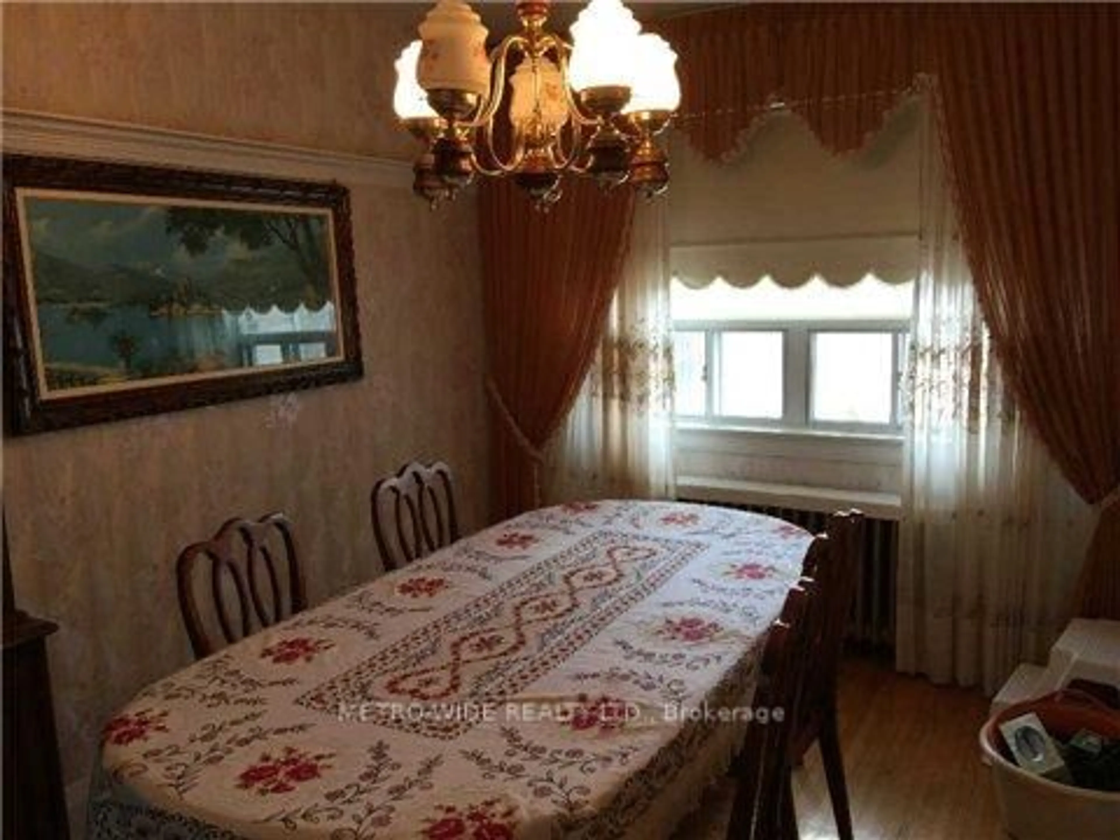 Dining room, wood/laminate floor for 33 Bowie Ave, Toronto Ontario M6E 2P2