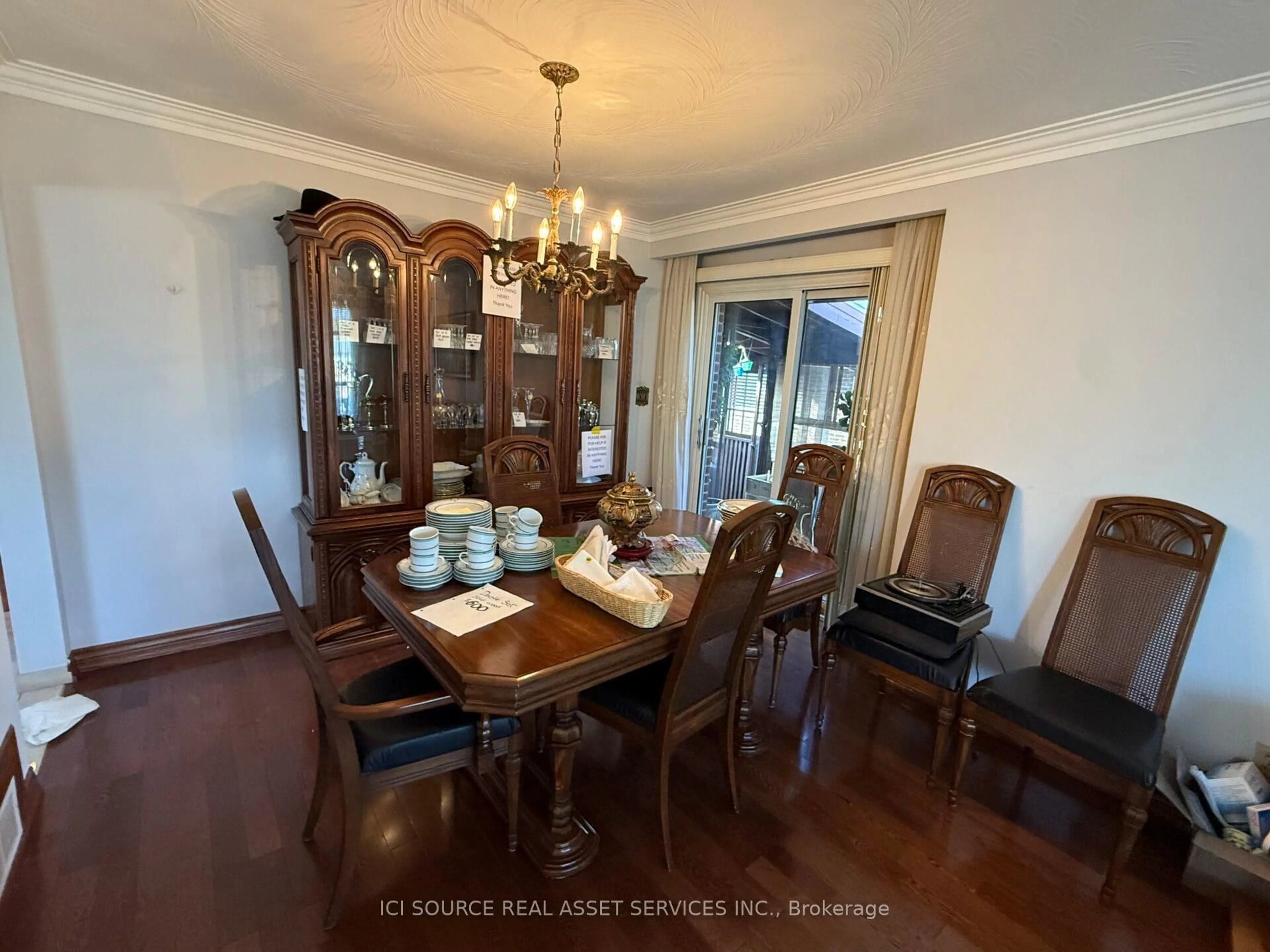 Dining room, wood/laminate floor for 23 Alladin Ave, Toronto Ontario M6L 1S4