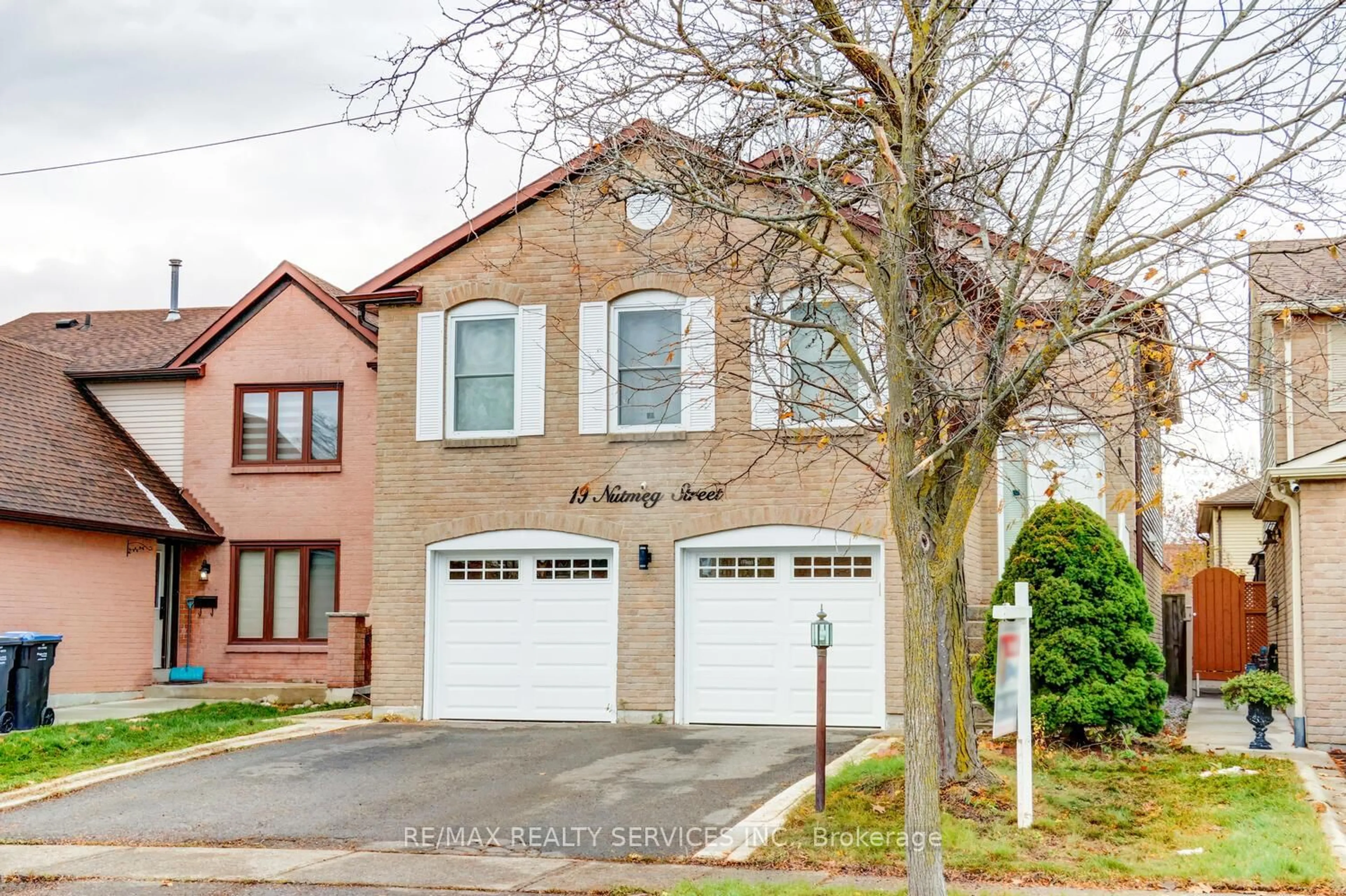 Home with brick exterior material, street for 19 Nutmeg St, Brampton Ontario L6S 4A7