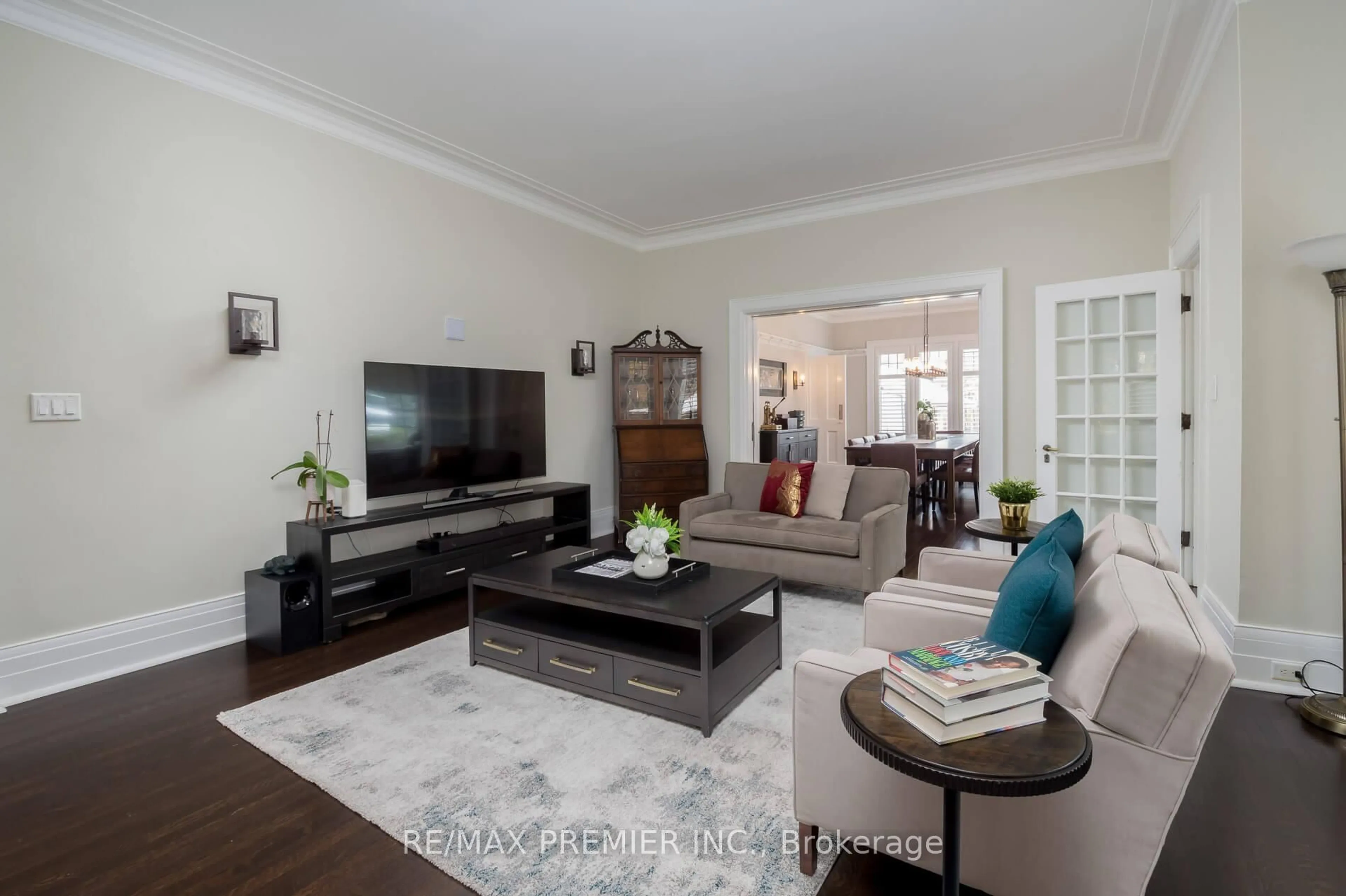 Living room with furniture, wood/laminate floor for 63 Main St #1,2,3, Brampton Ontario L6Y 1M9