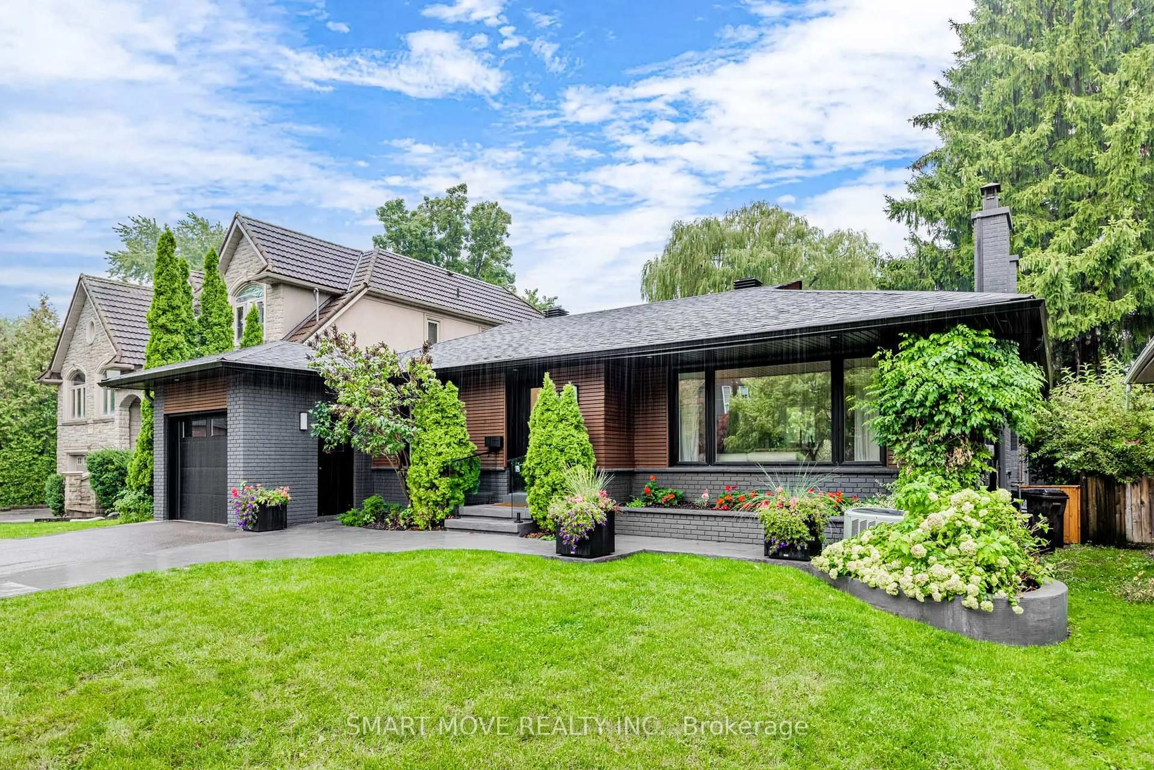 Home with brick exterior material, street for 32 Burnelm Dr, Toronto Ontario M9B 4N3