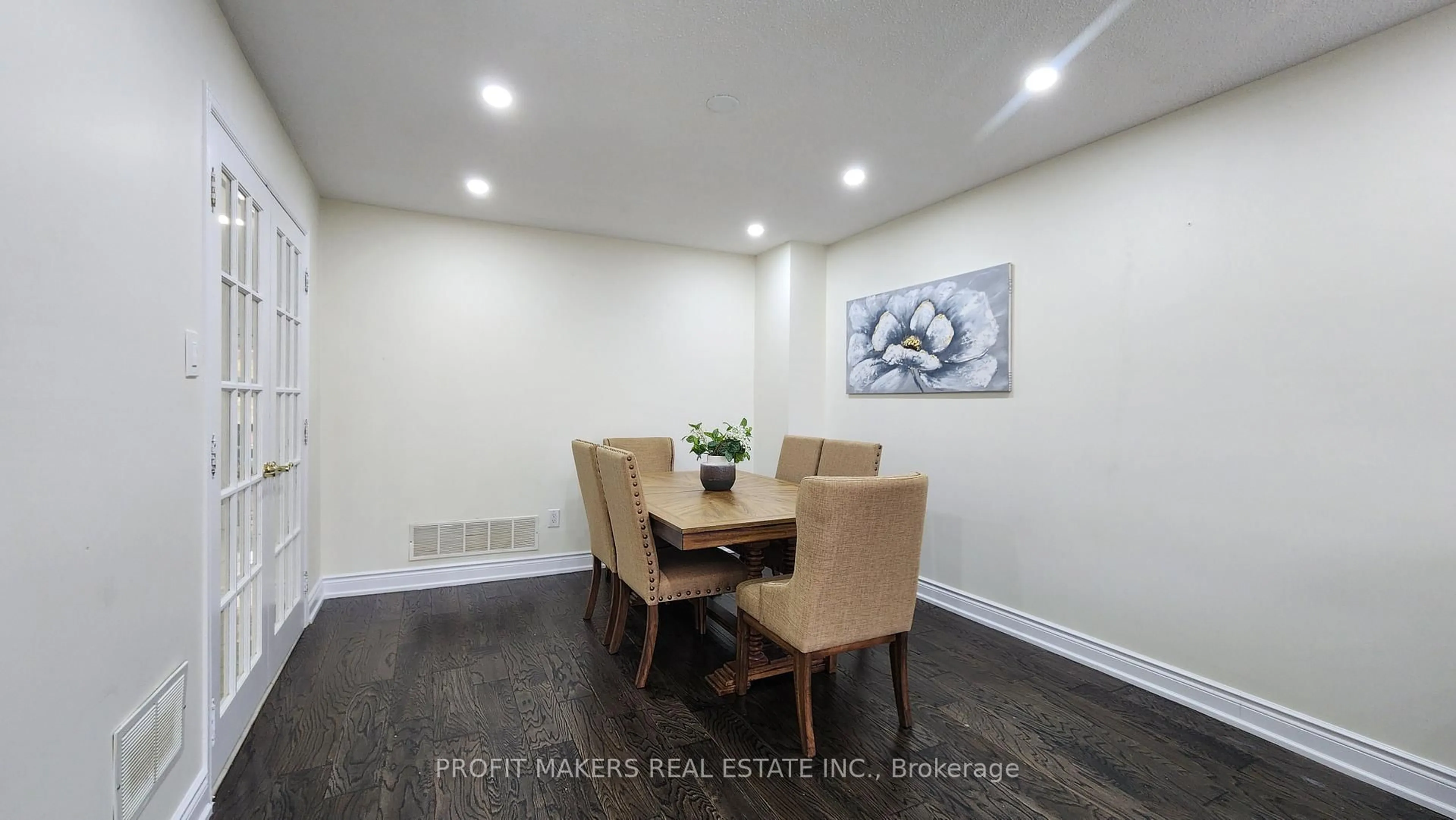 Dining room, wood/laminate floor for 49 Horsham St, Brampton Ontario L6S 3R4