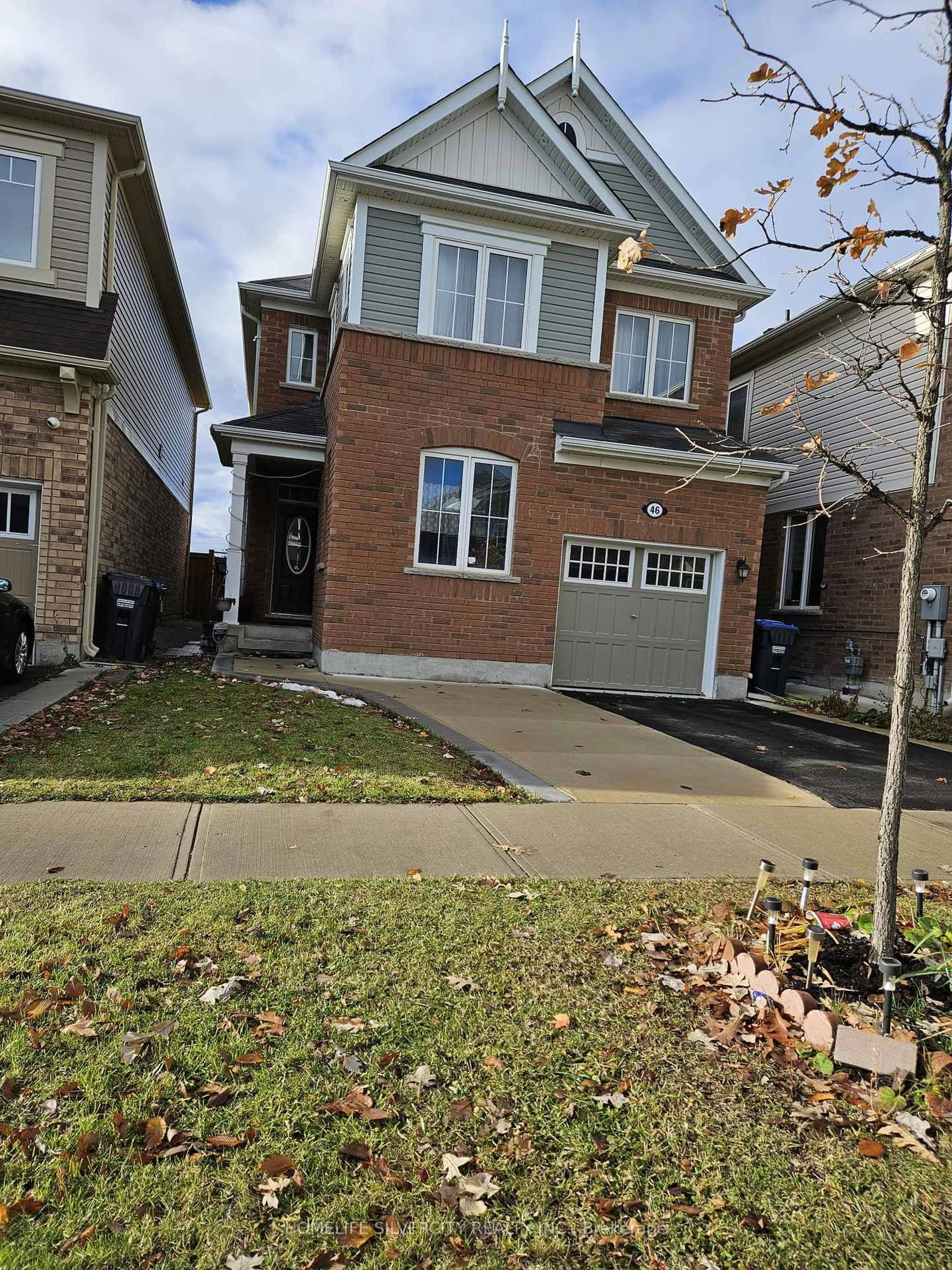 Home with brick exterior material, street for 46 Callandar Rd, Brampton Ontario L7A 4T8