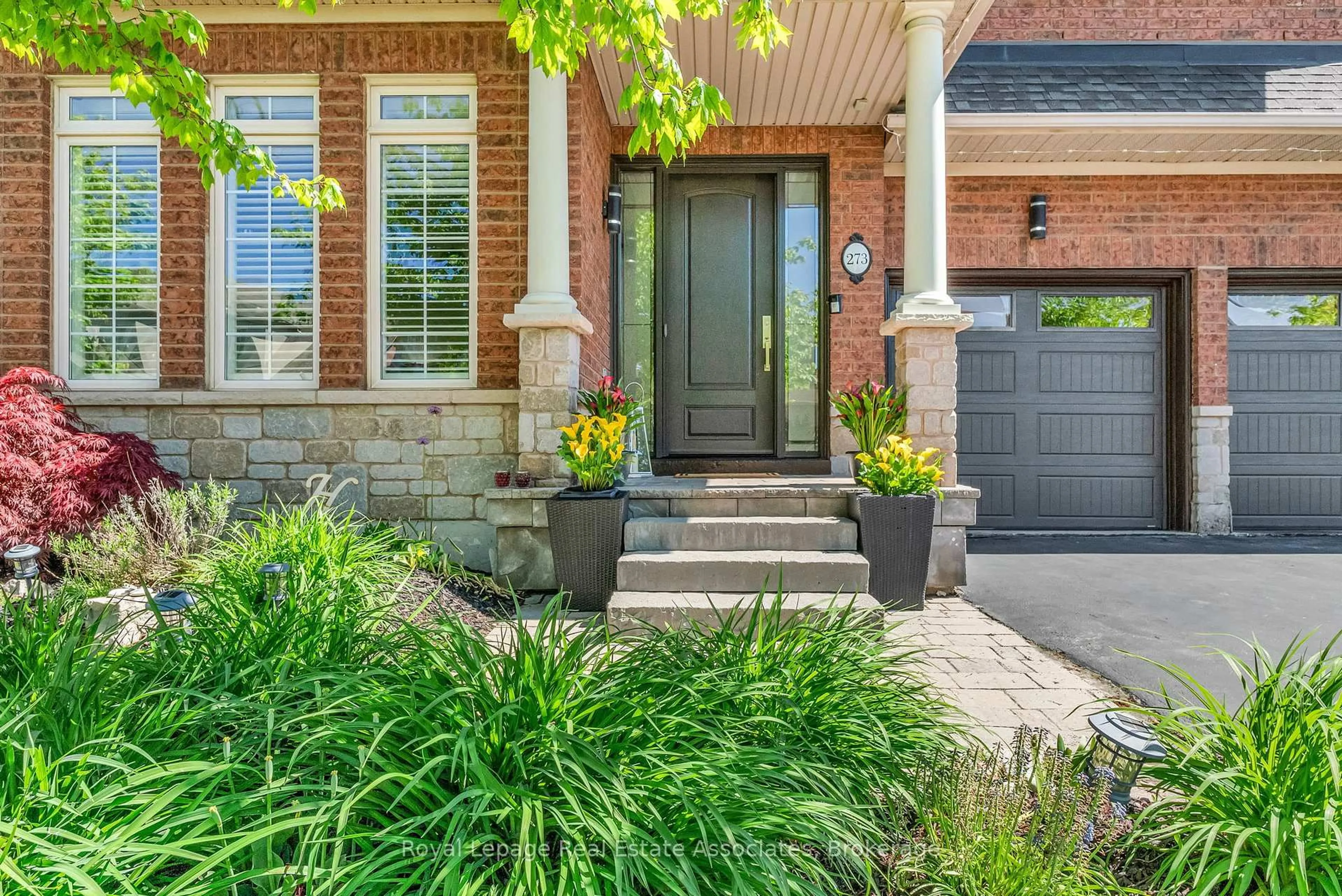 Home with brick exterior material, street for 273 Duskywing Way, Oakville Ontario L6L 6X5