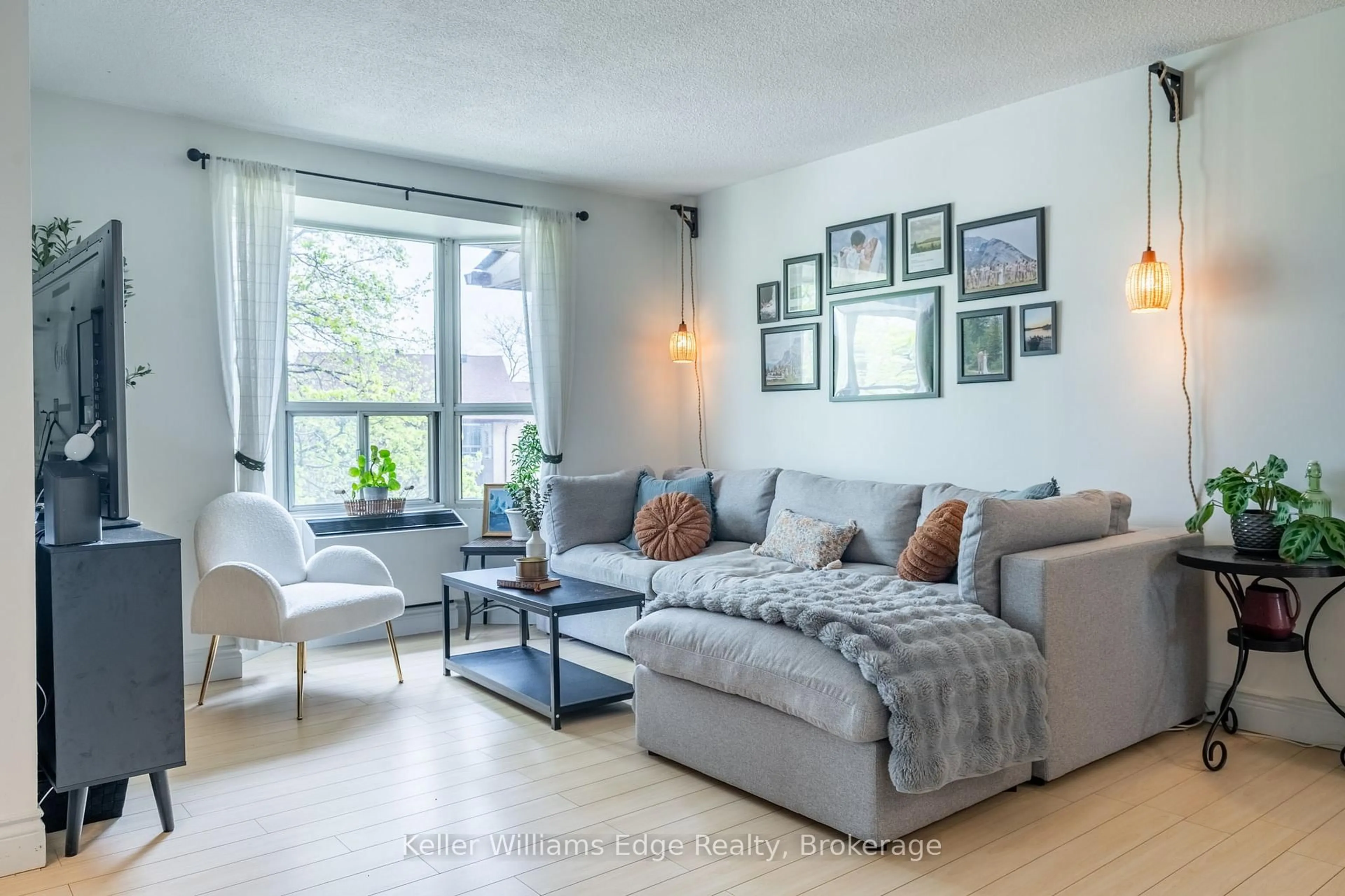 Living room with furniture, unknown for 3835 Lake Shore Blvd #305, Toronto Ontario M8W 1R2