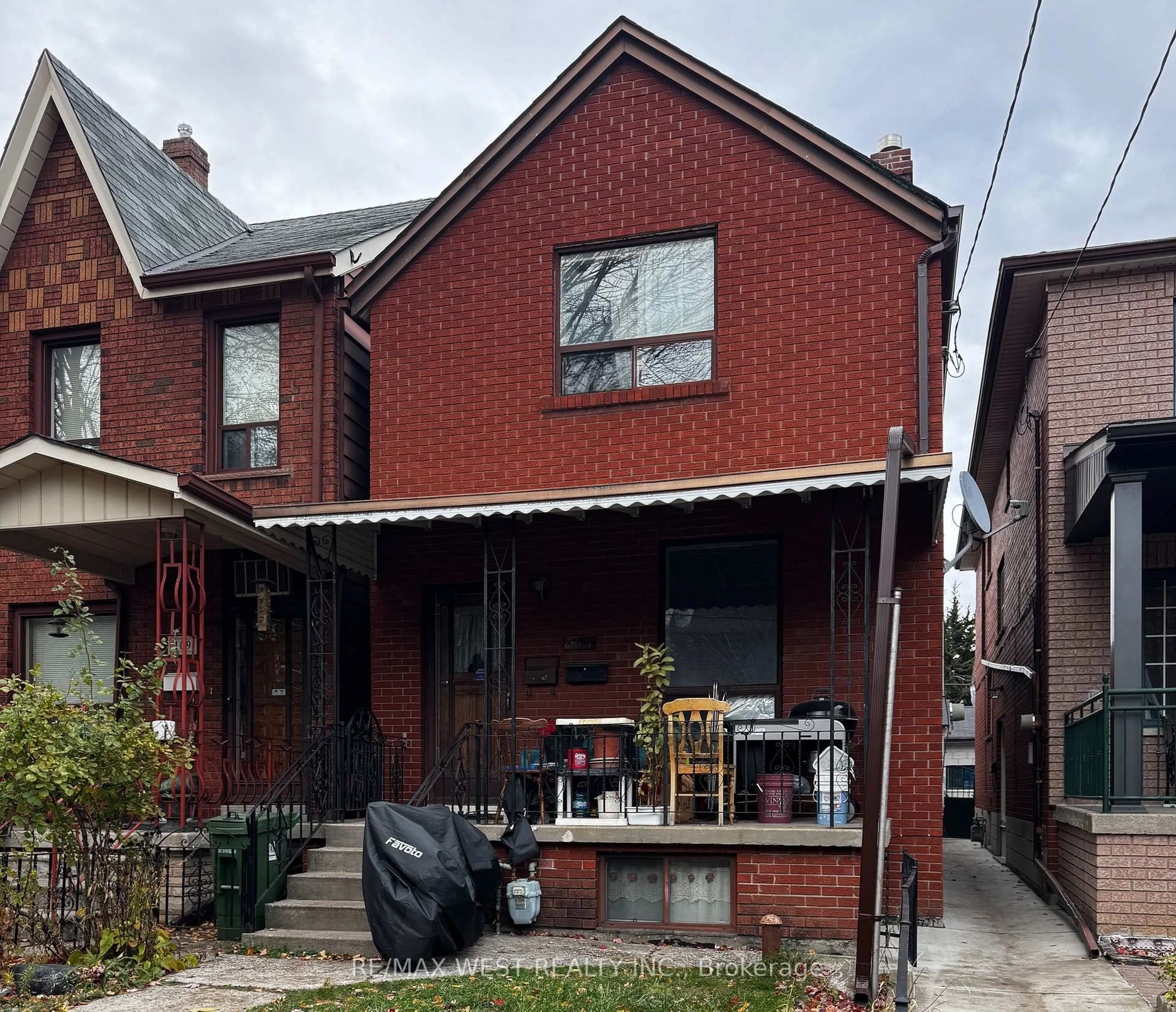 Home with brick exterior material, street for 407 Concord Ave, Toronto Ontario M6H 2P9