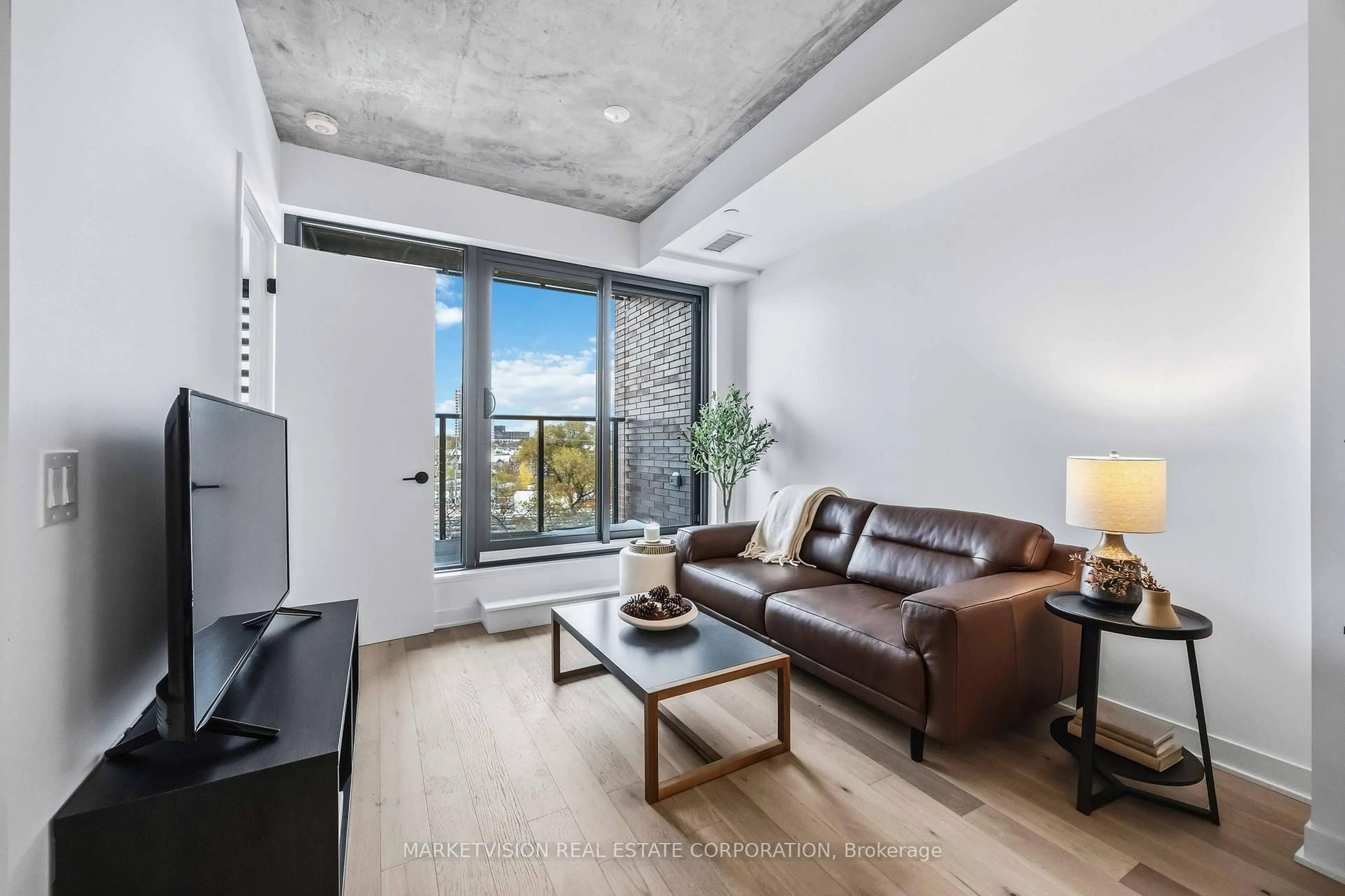 Living room with furniture, unknown for 2625 Dundas St #506, Toronto Ontario M6P 1X9