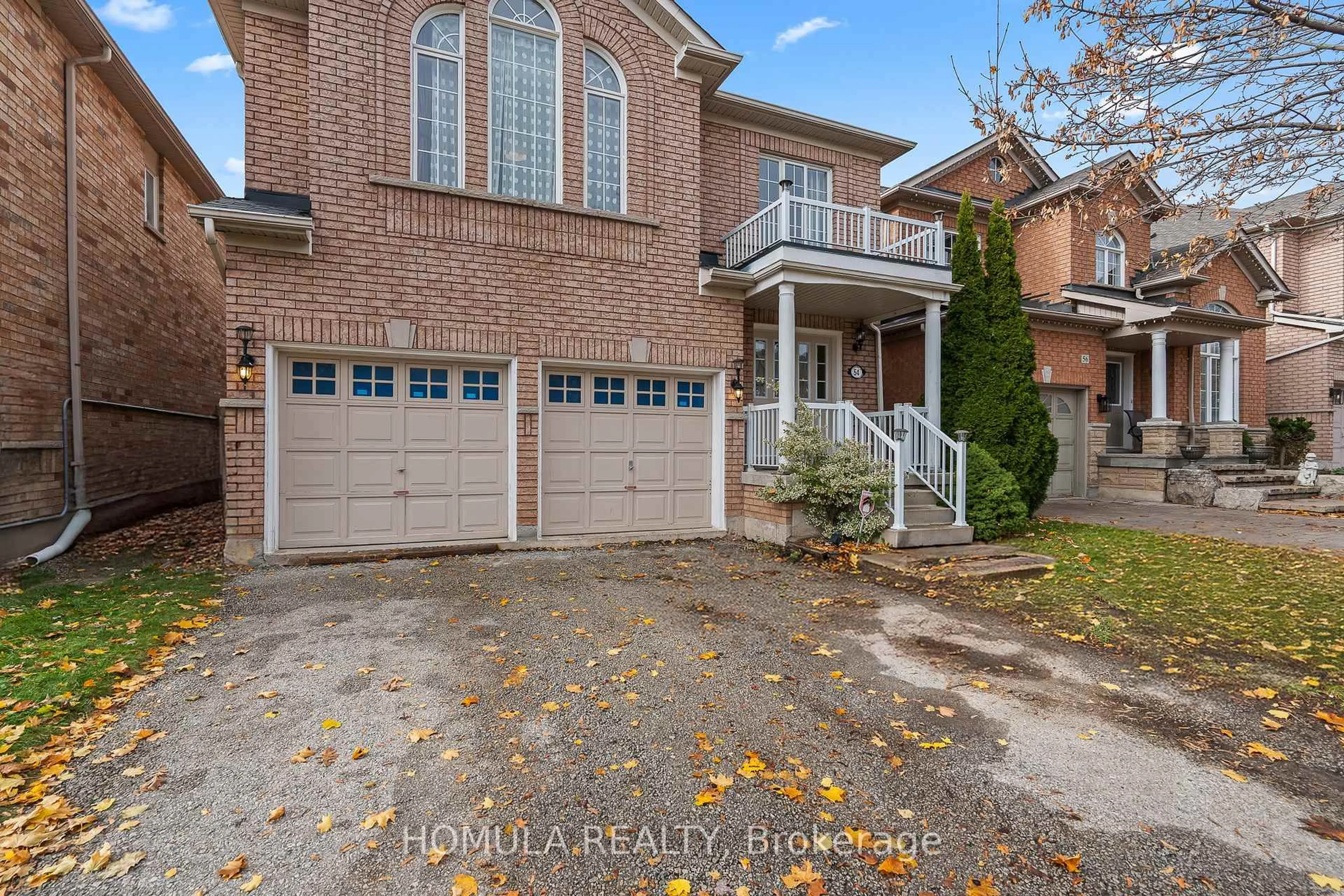 Home with brick exterior material, street for 54 Queen Mary Dr, Brampton Ontario L7A 2K3