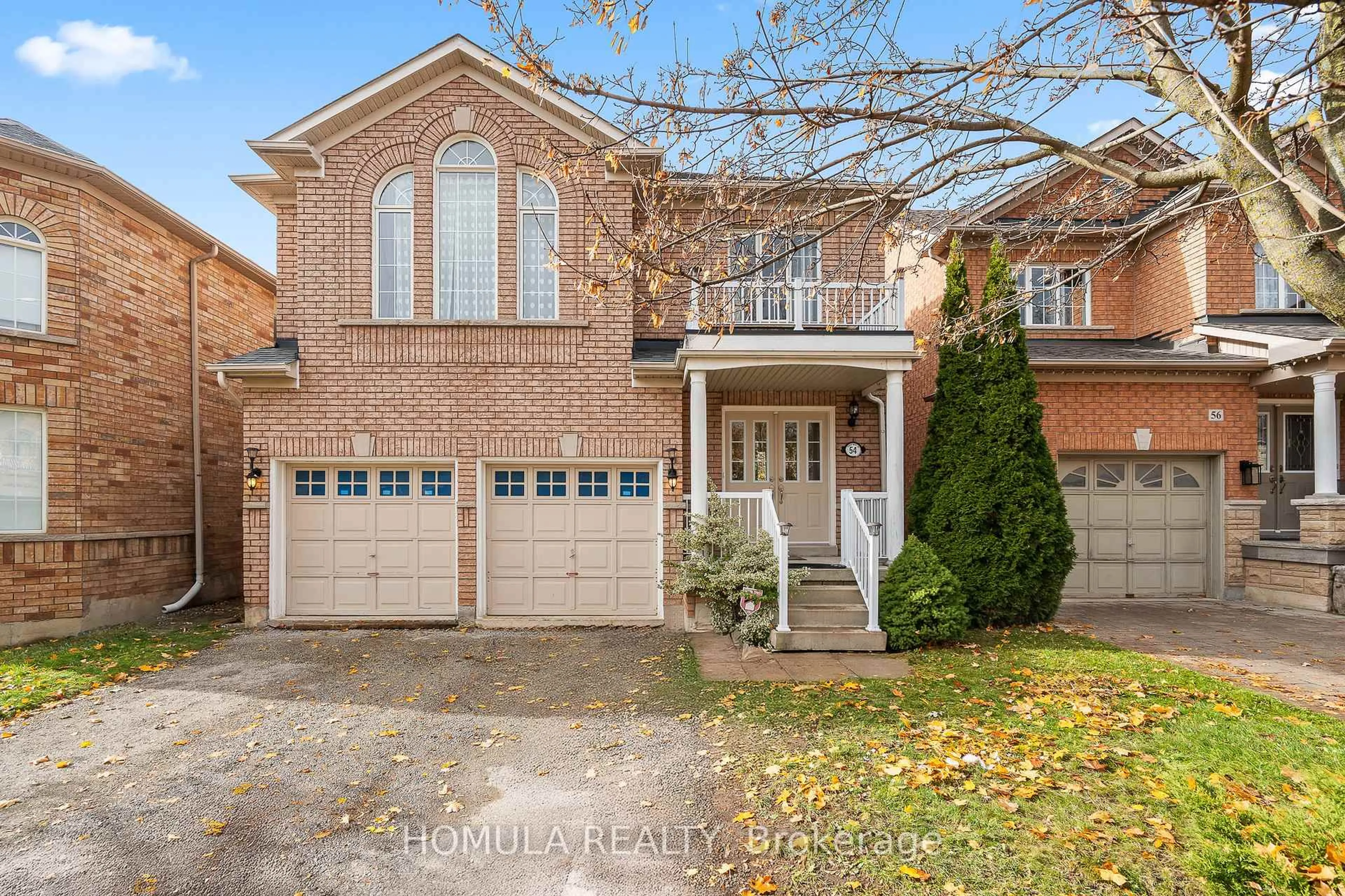 Home with brick exterior material, street for 54 Queen Mary Dr, Brampton Ontario L7A 2K3