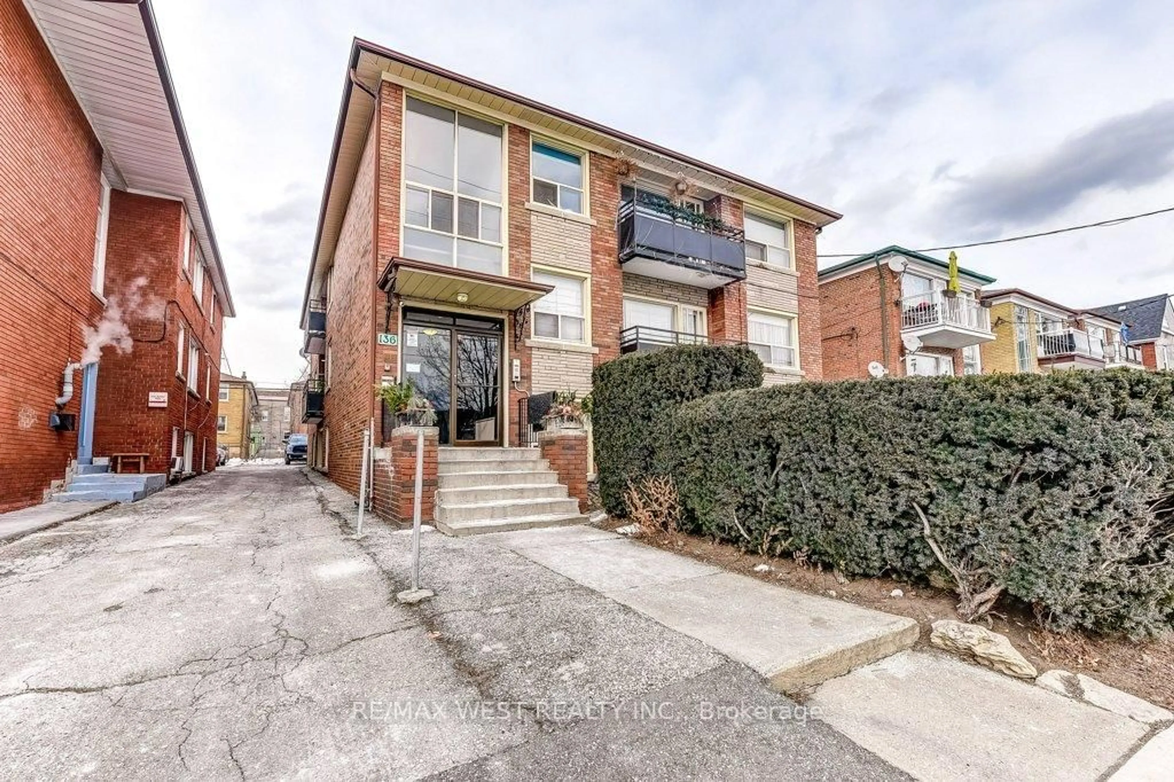 Home with brick exterior material, street for 136 Portland St, Toronto Ontario M8Y 1B2