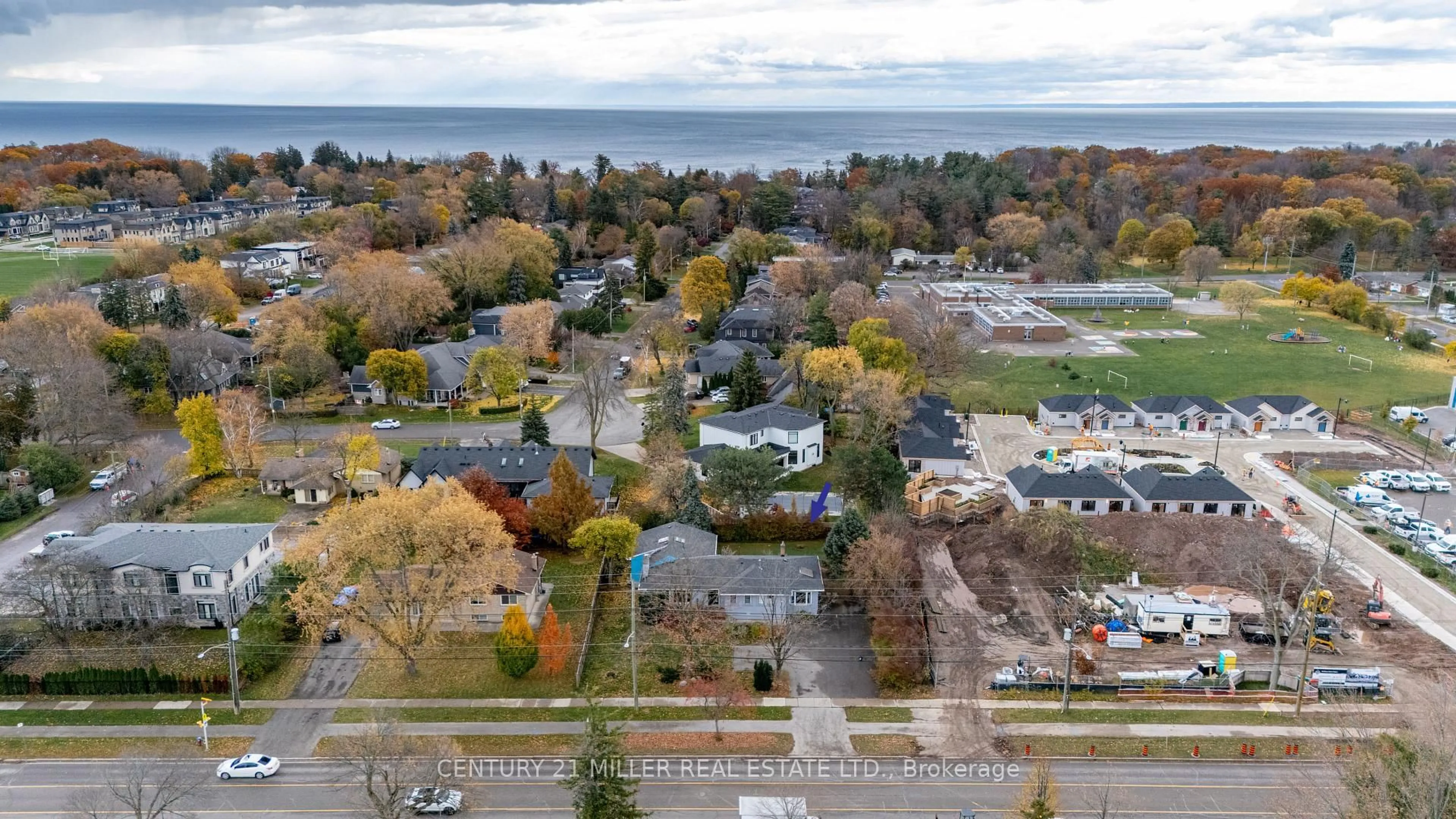 A pic from outside/outdoor area/front of a property/back of a property/a pic from drone, water/lake/river/ocean view for 1242 Rebecca St, Oakville Ontario L6L 1Z2