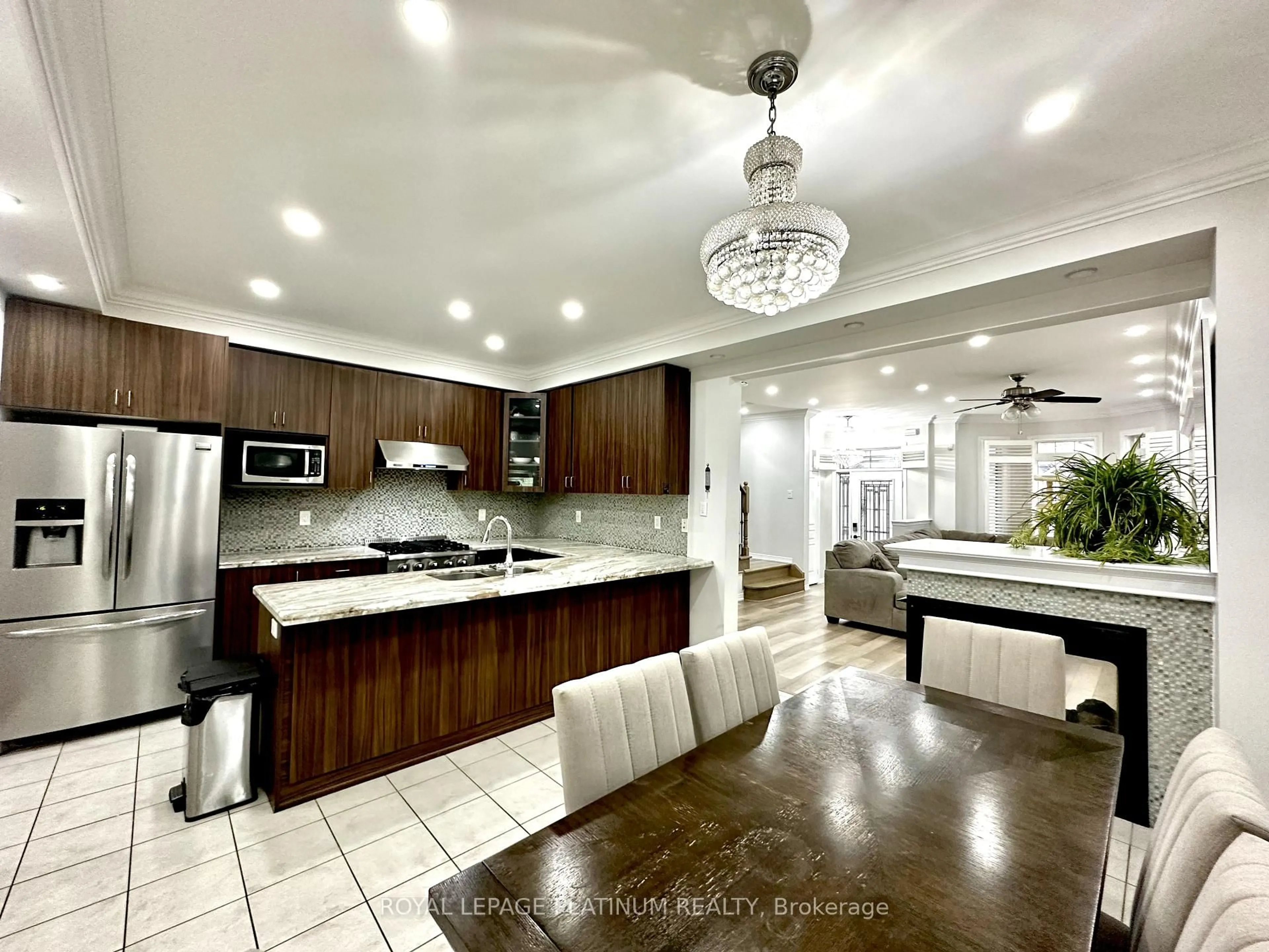 Open concept kitchen, ceramic/tile floor for 68 Fallmeadow Circ, Brampton Ontario L6Y 0Y7