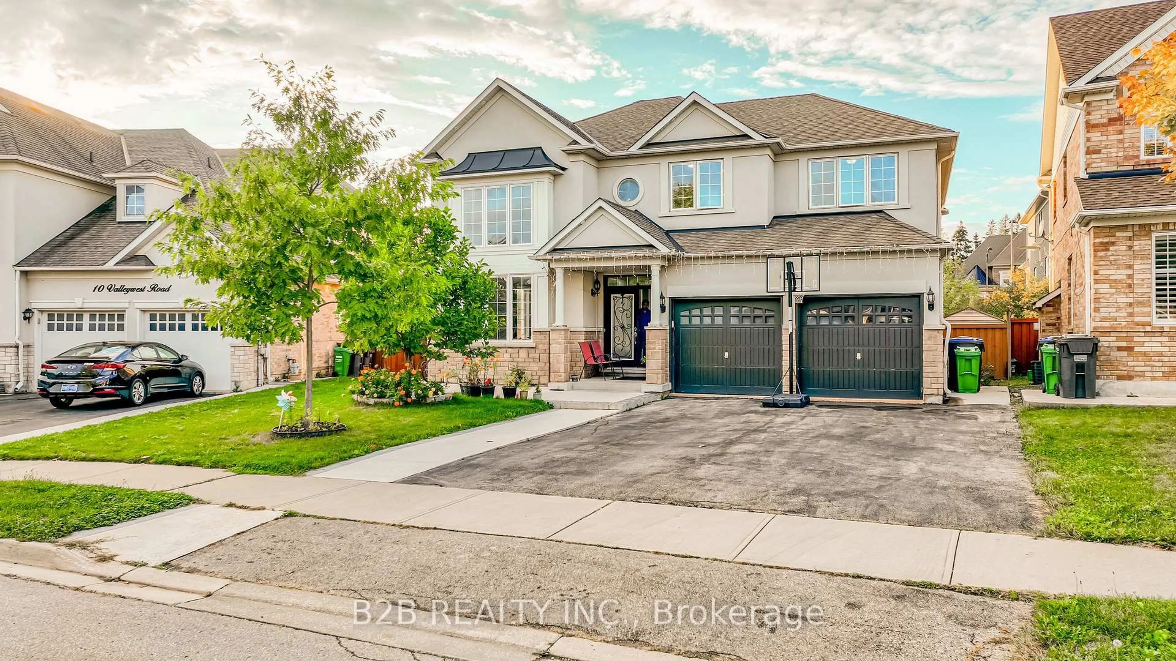Home with brick exterior material, street for 12 Valleywest Rd, Brampton Ontario L6P 2J9