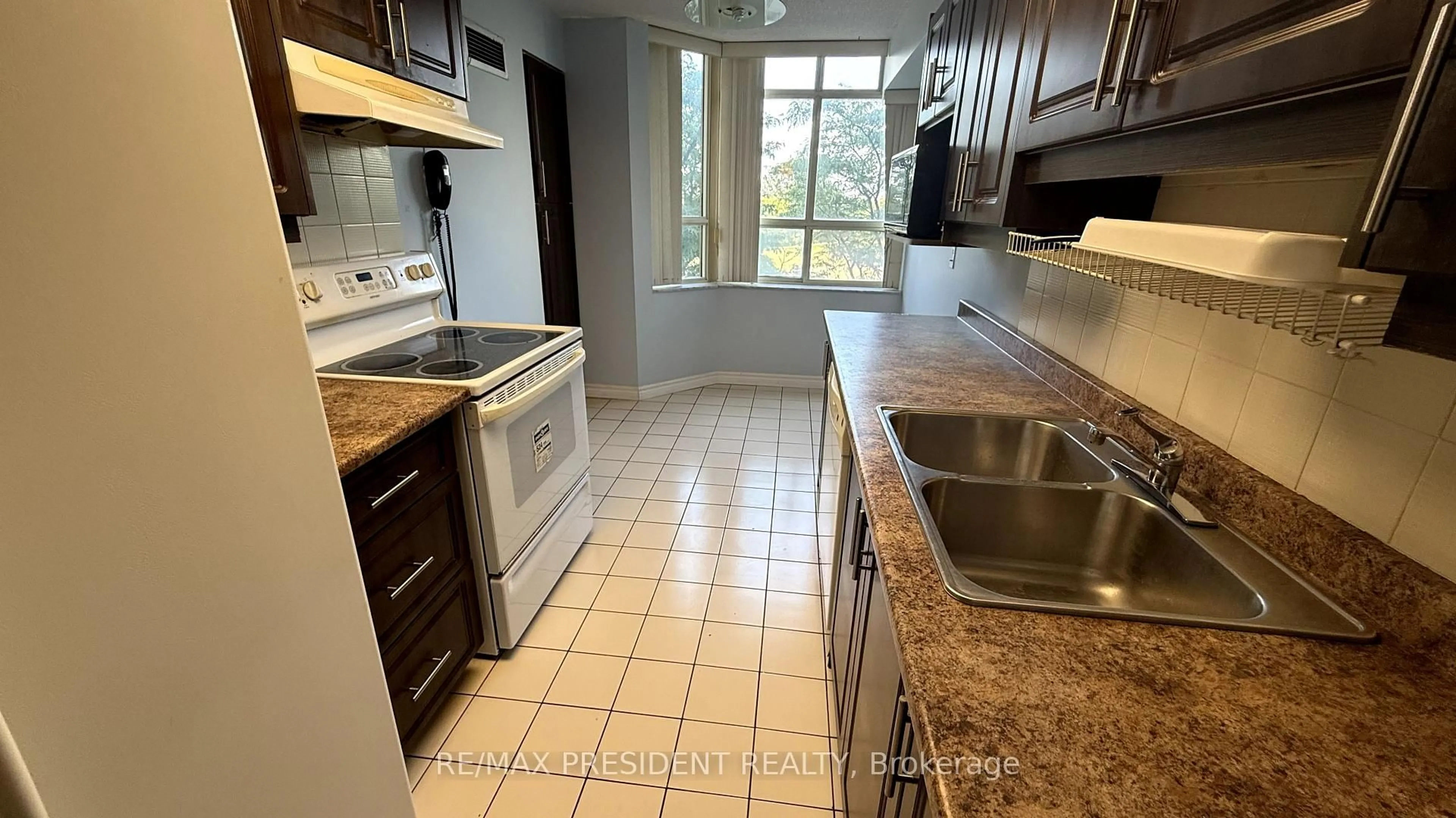 Standard kitchen, ceramic/tile floor for 30 Malta Ave #206, Brampton Ontario L6V 4A4