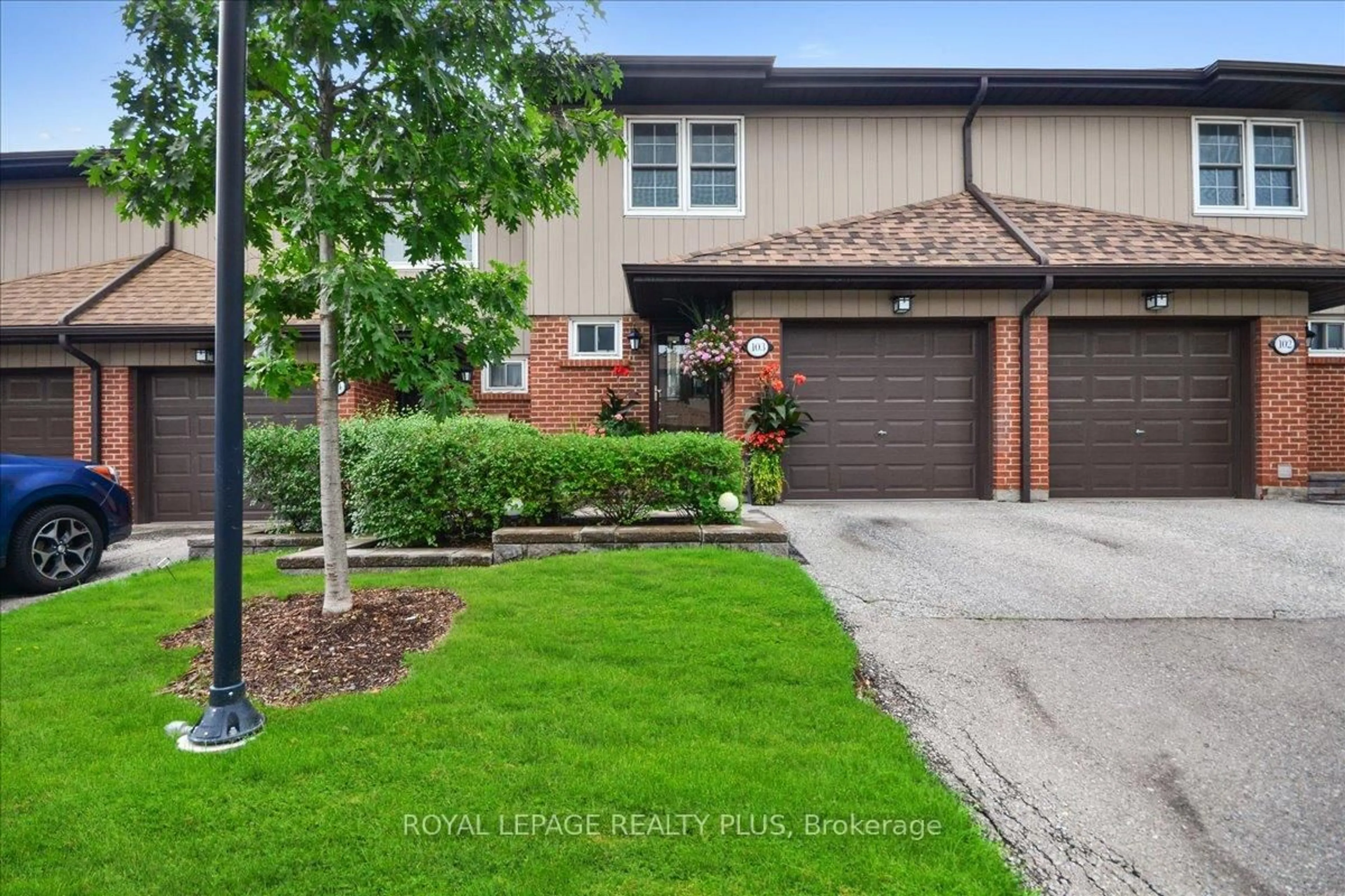 Home with brick exterior material, street for 1951 Rathburn Rd #103, Mississauga Ontario L4W 2N9