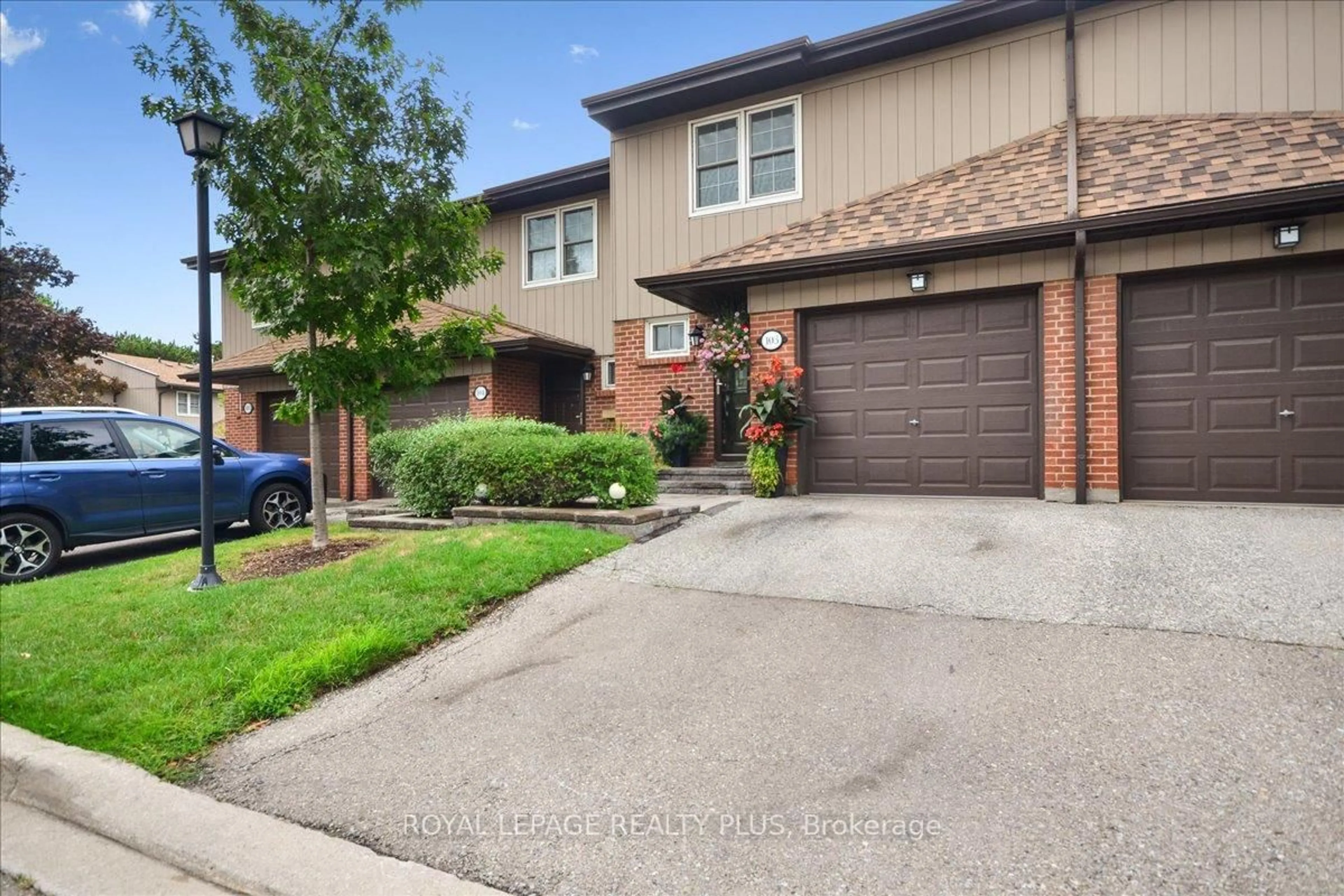 Home with brick exterior material, street for 1951 Rathburn Rd #103, Mississauga Ontario L4W 2N9