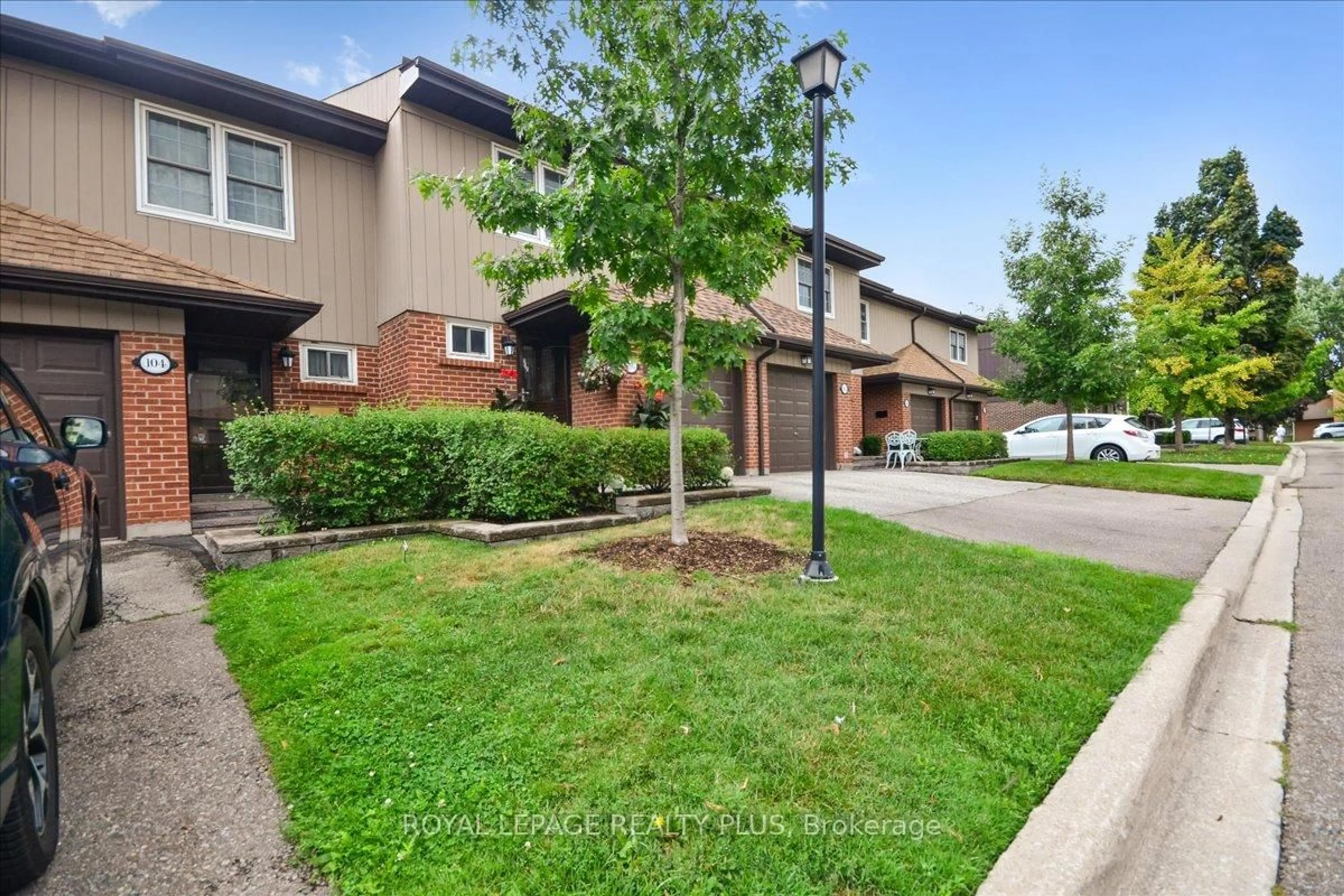A pic from outside/outdoor area/front of a property/back of a property/a pic from drone, street for 1951 Rathburn Rd #103, Mississauga Ontario L4W 2N9