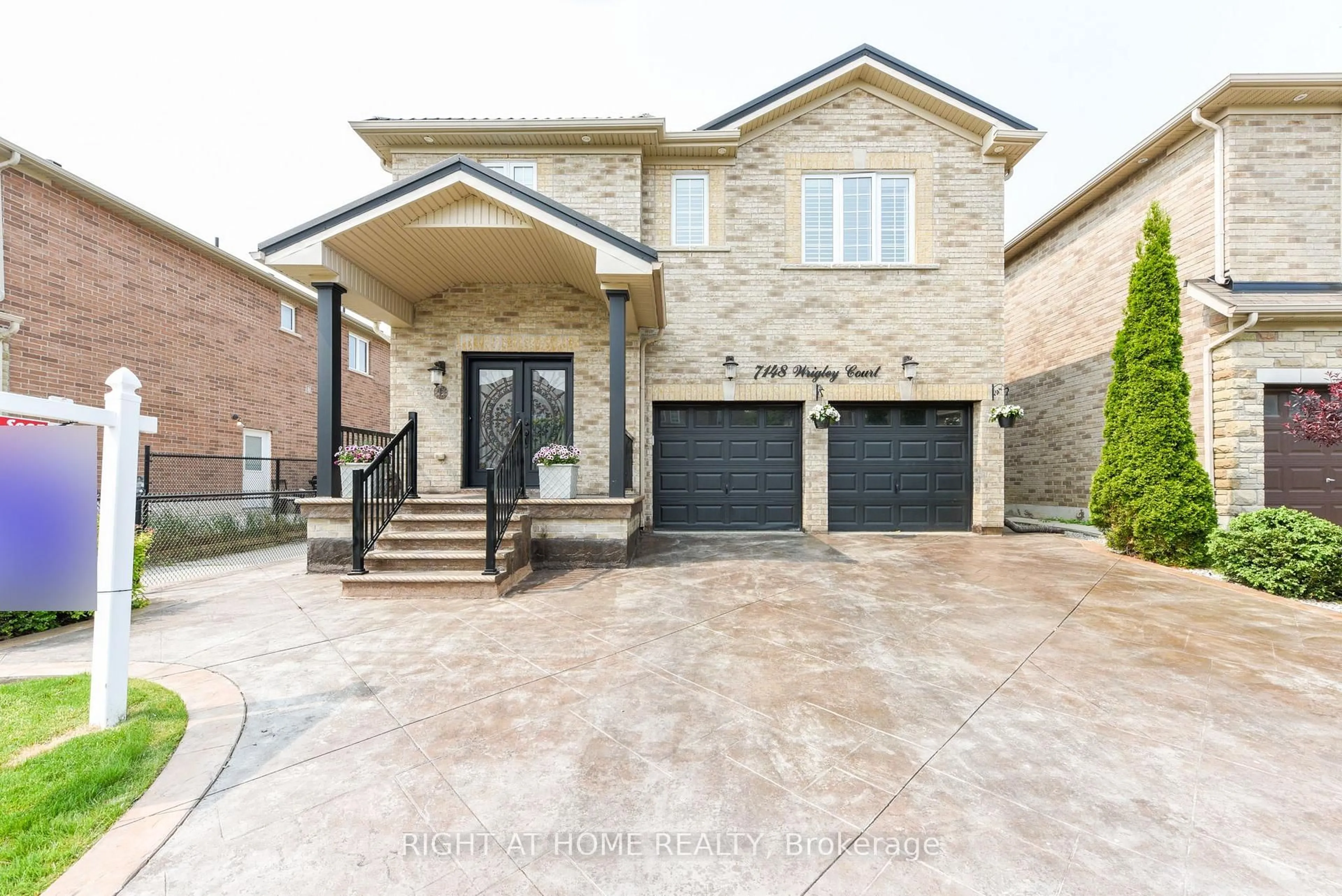 Home with brick exterior material, street for 7148 Wrigley Crt, Mississauga Ontario L5W 0C8