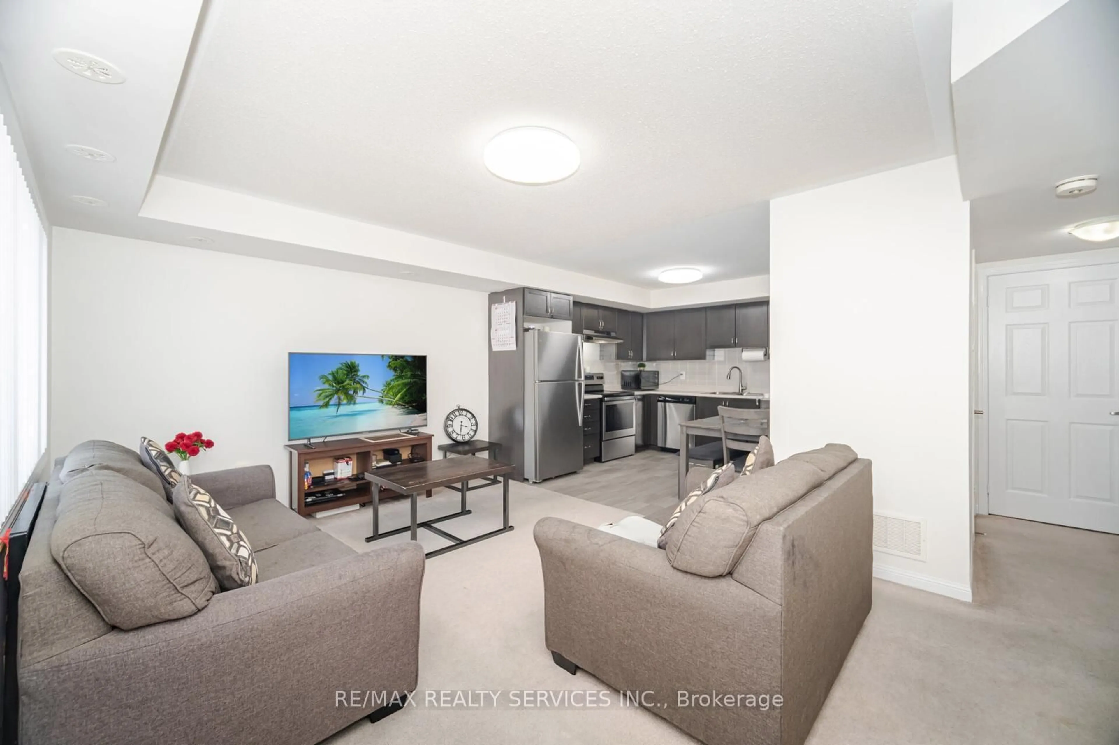 Living room with furniture, unknown for 250 Sunny Meadow Blvd #320, Brampton Ontario L6R 3Y7