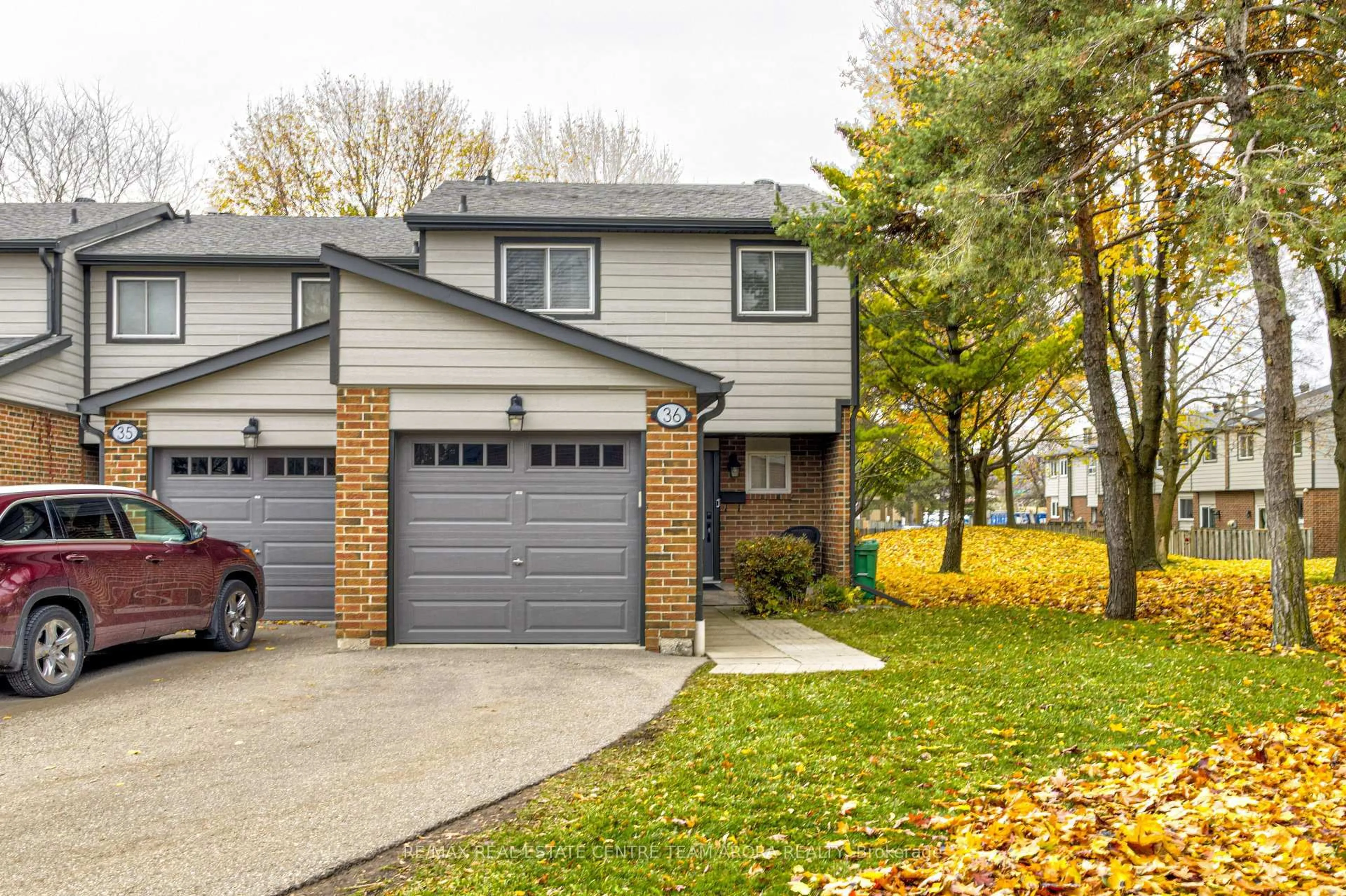 Home with vinyl exterior material, street for 525 Meadows Blvd #36, Mississauga Ontario L4Z 1H2