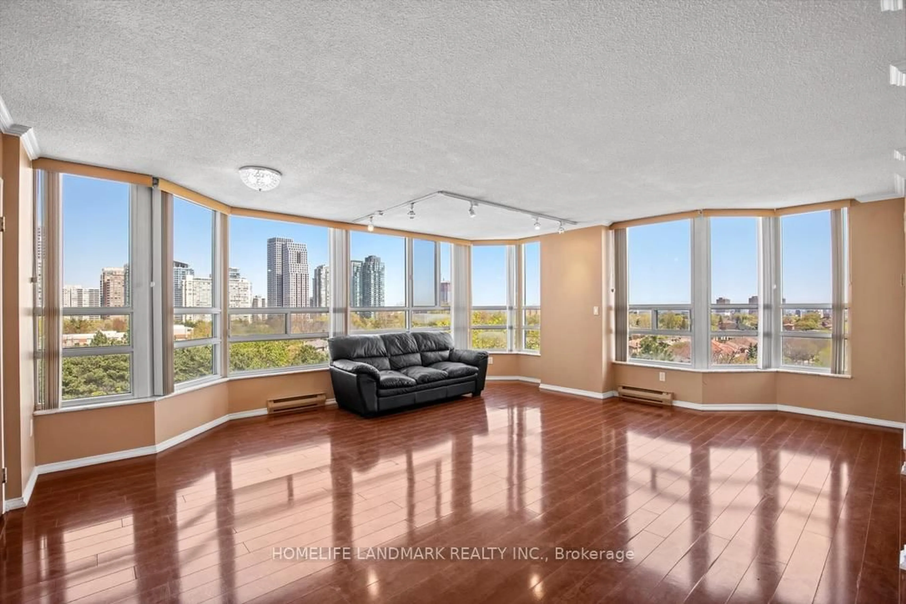 Living room with furniture, unknown for 250 Webb Dr #704, Mississauga Ontario L5B 3Z4