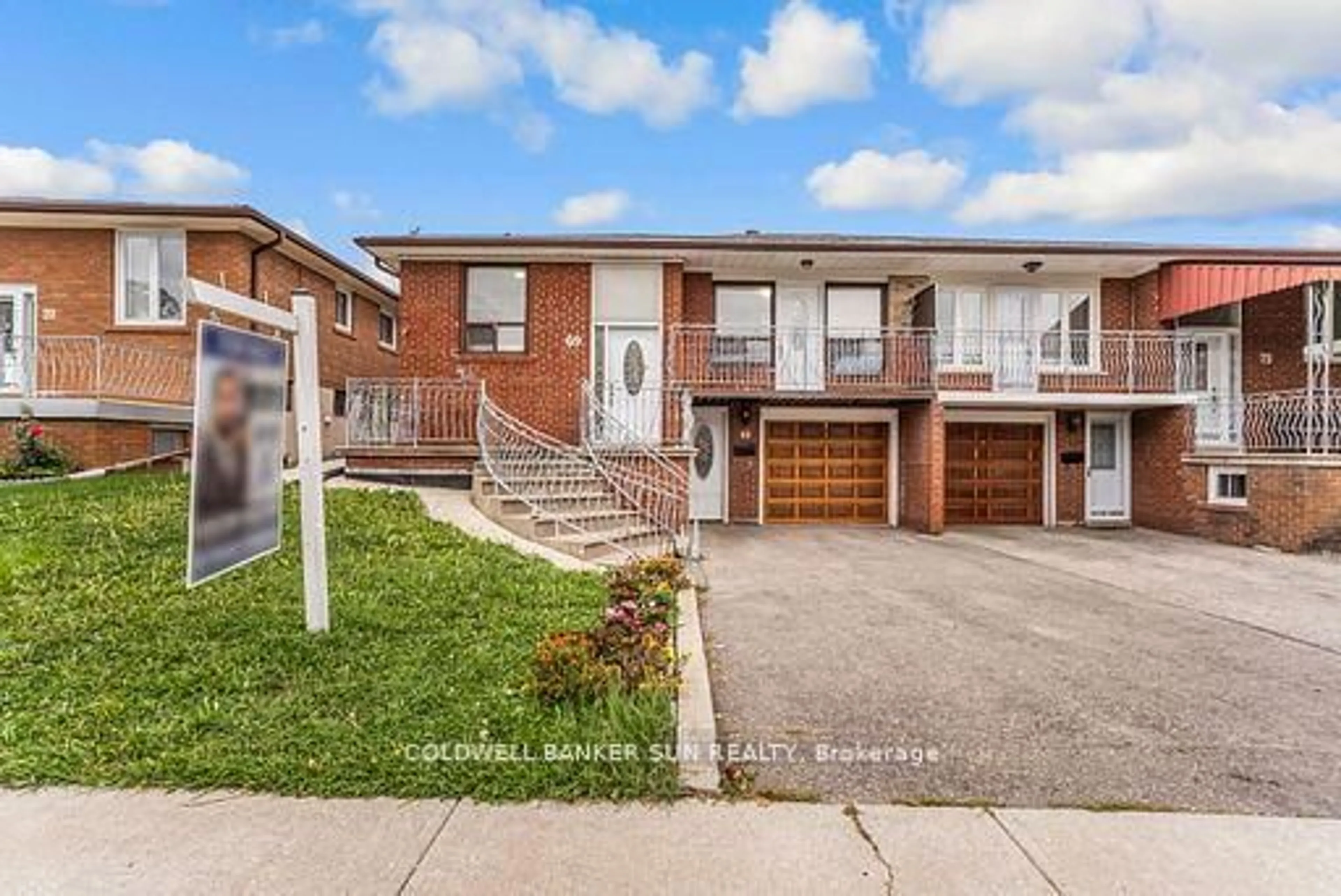 Home with brick exterior material, street for 69 Songwood Dr, Toronto Ontario M9M 1X4