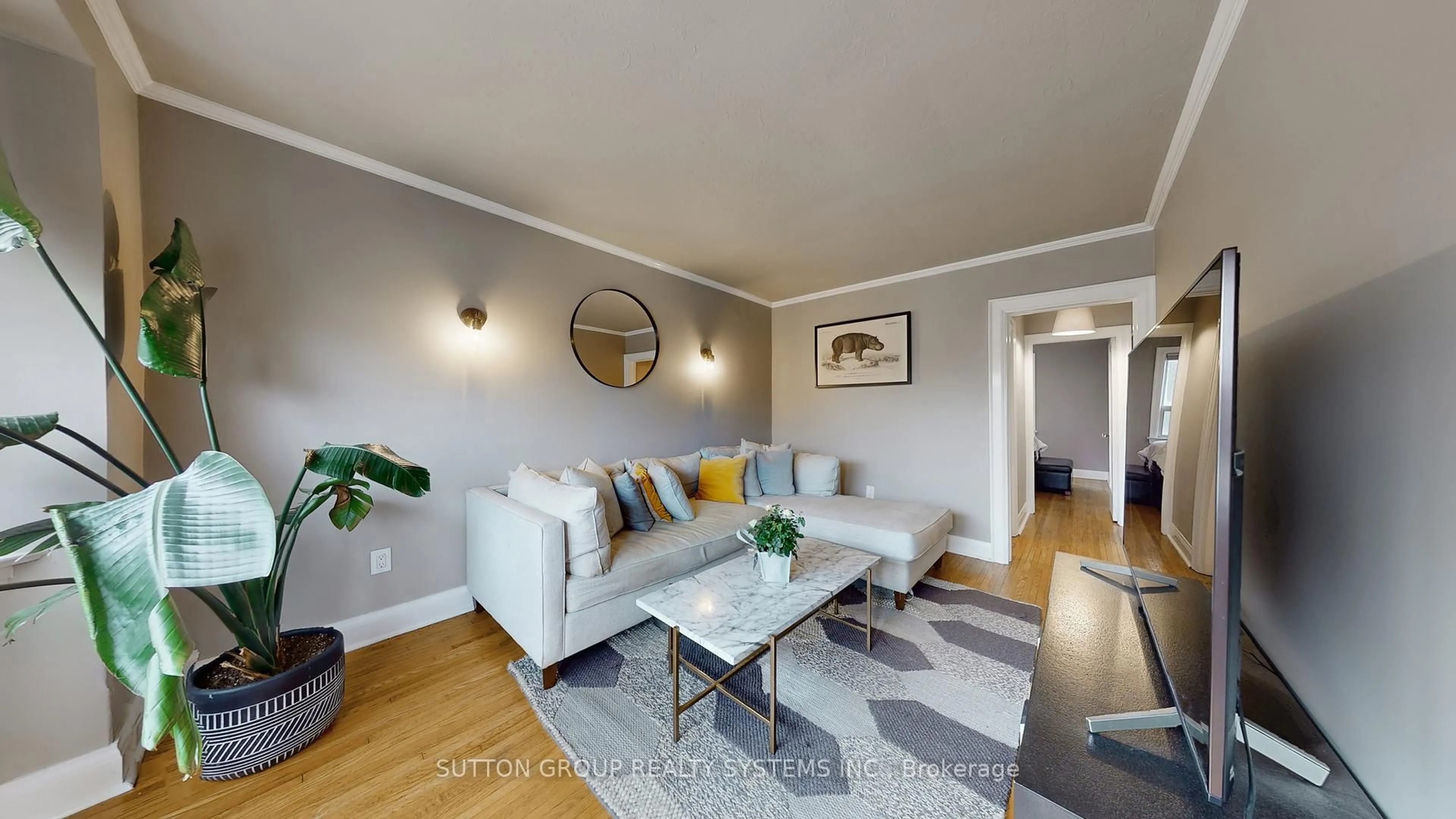 Living room with furniture, wood/laminate floor for 51 Juliet Cres, Toronto Ontario M6M 1N5