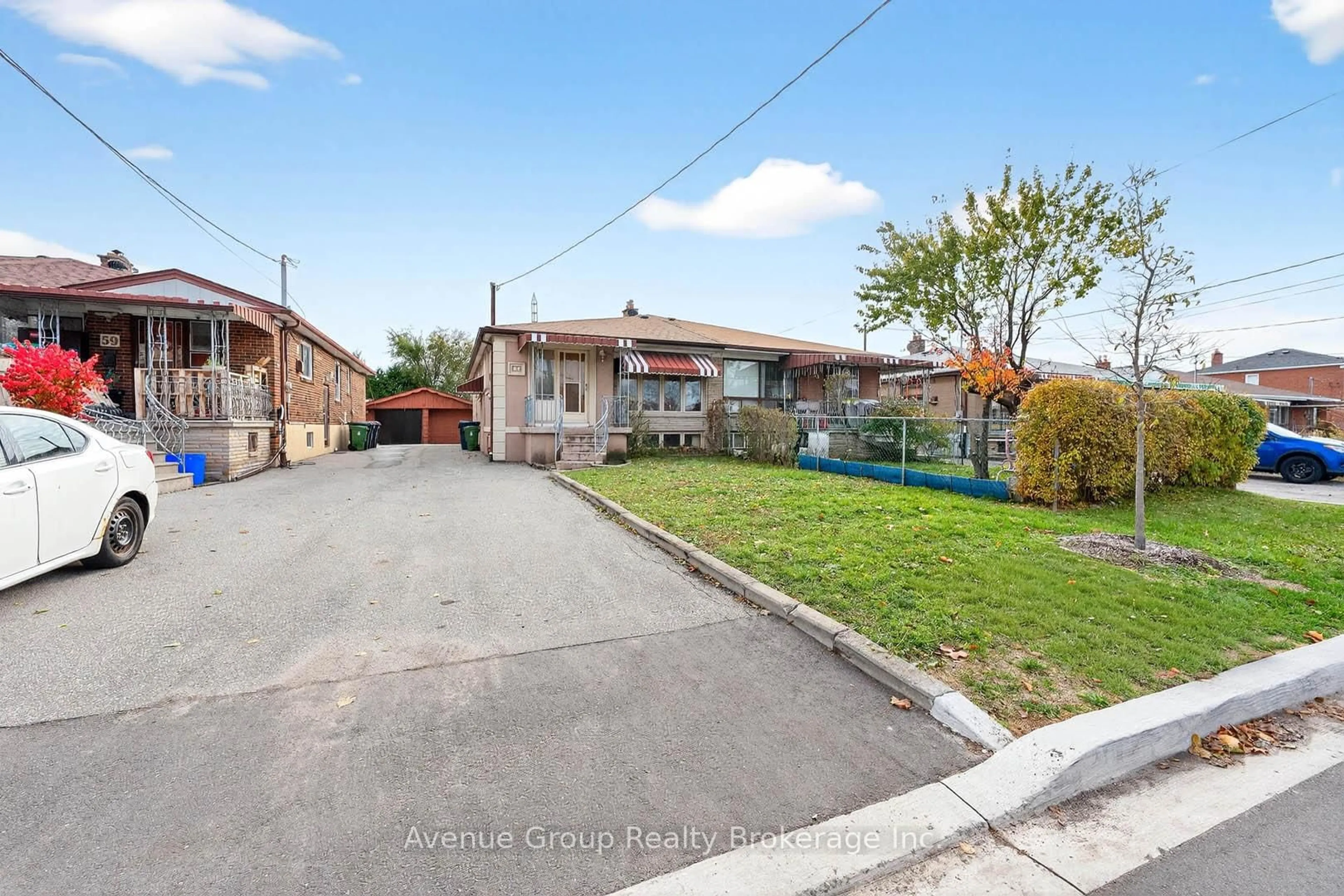 A pic from outside/outdoor area/front of a property/back of a property/a pic from drone, street for 57 Thurrock Rd, Toronto Ontario M3L 1P5