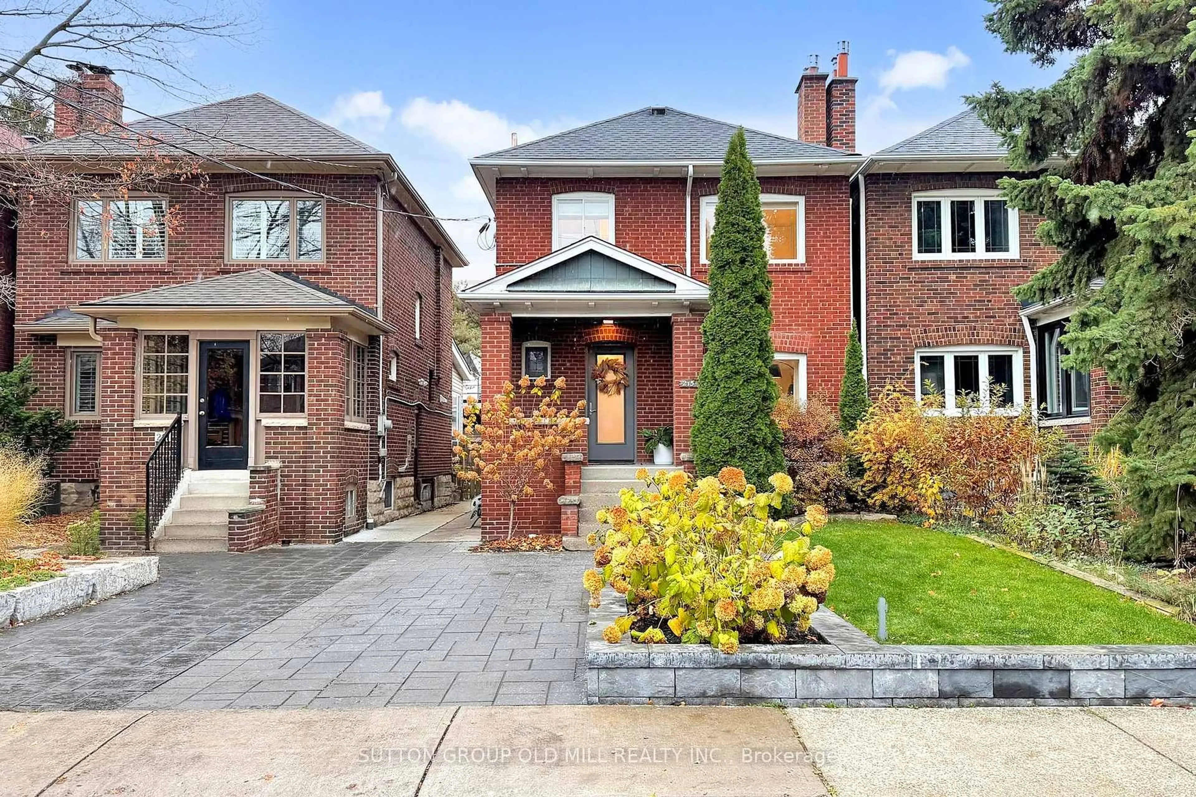 Home with brick exterior material, street for 215 Humbercrest Blvd, Toronto Ontario M6S 4L5