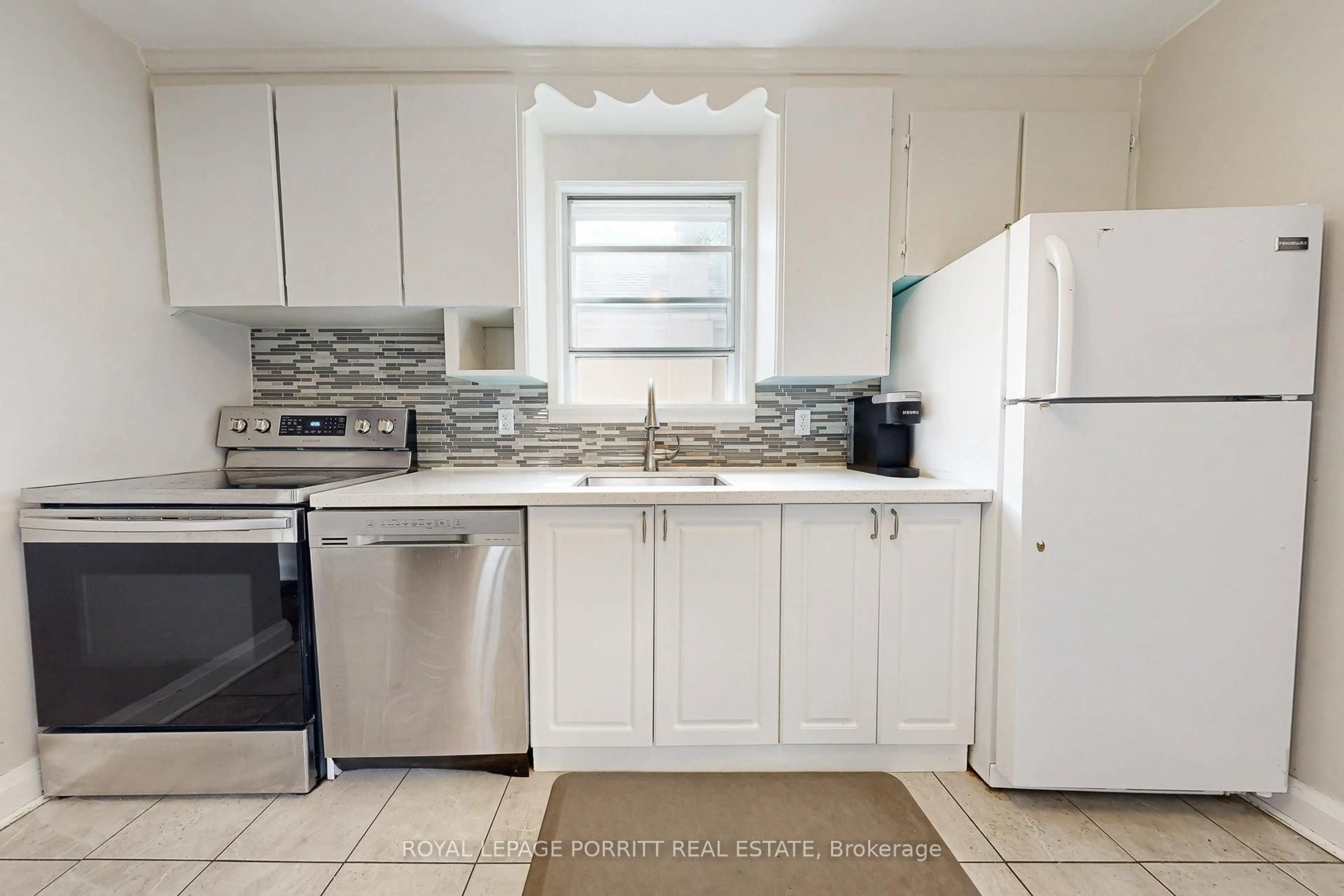 Standard kitchen, ceramic/tile floor for 217 Alderbrae Ave, Toronto Ontario M8W 4K4