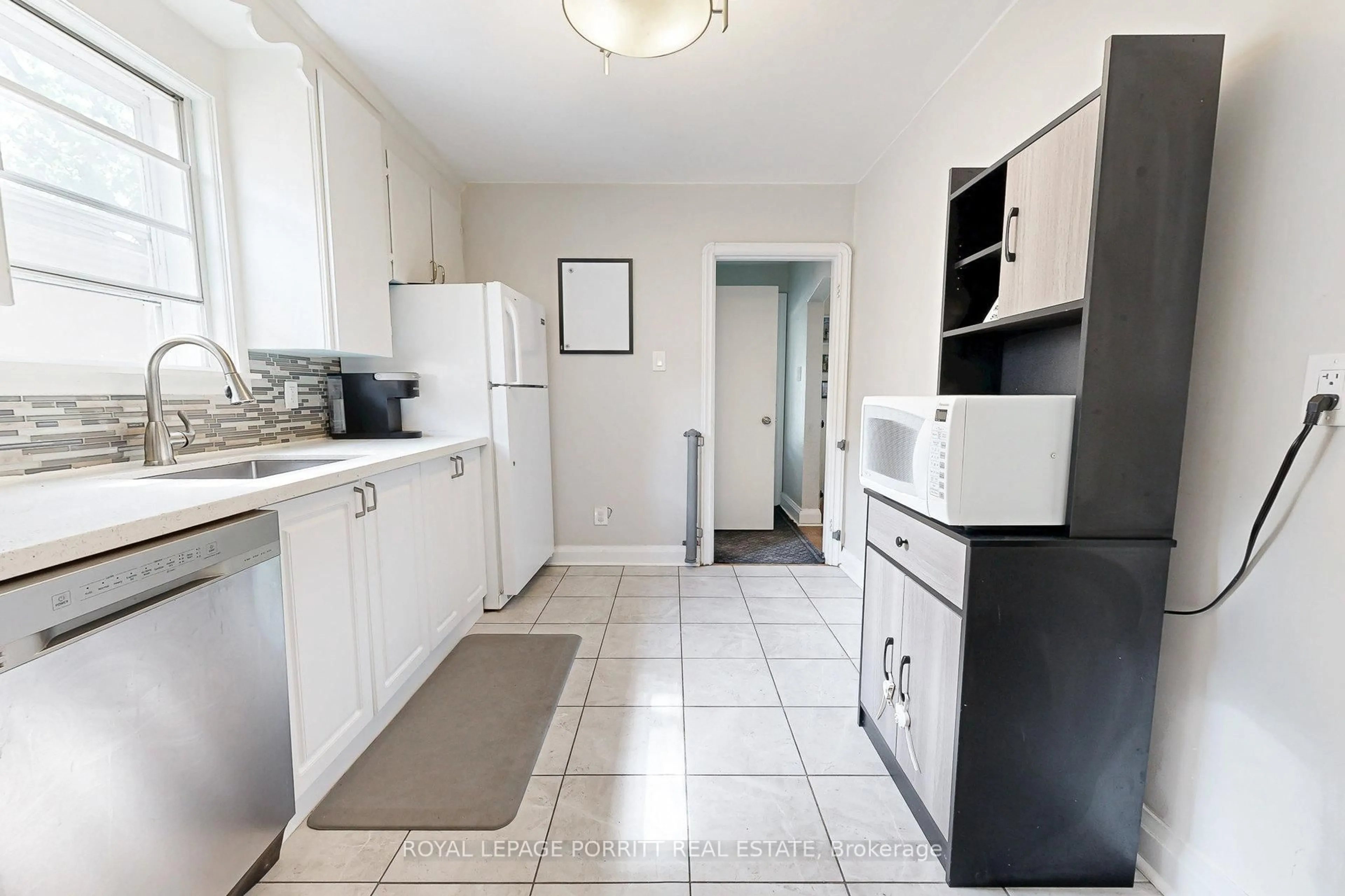 Standard kitchen, ceramic/tile floor for 217 Alderbrae Ave, Toronto Ontario M8W 4K4