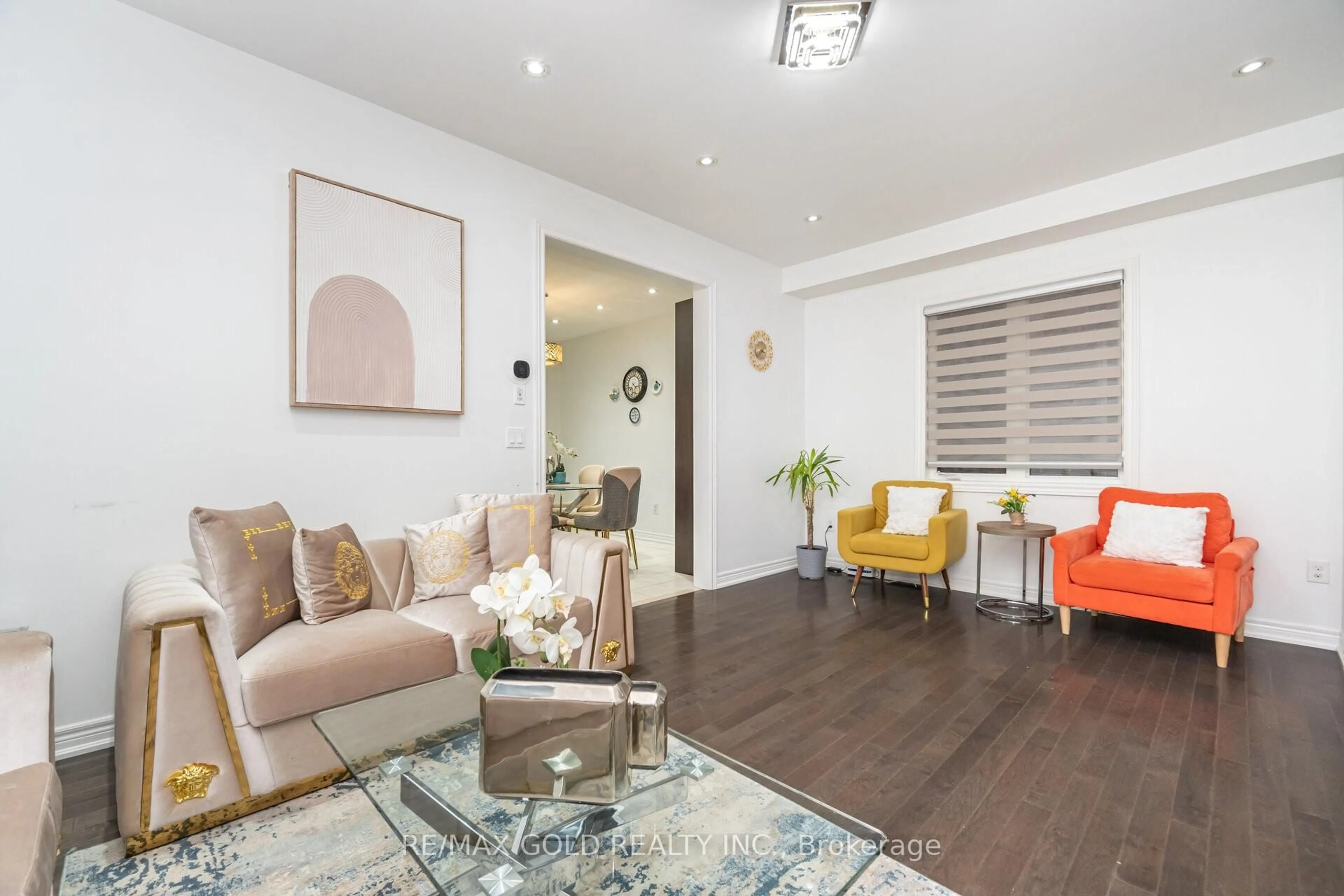 Living room with furniture, wood/laminate floor for 79 Lesabre Cres, Brampton Ontario L6P 3Z9