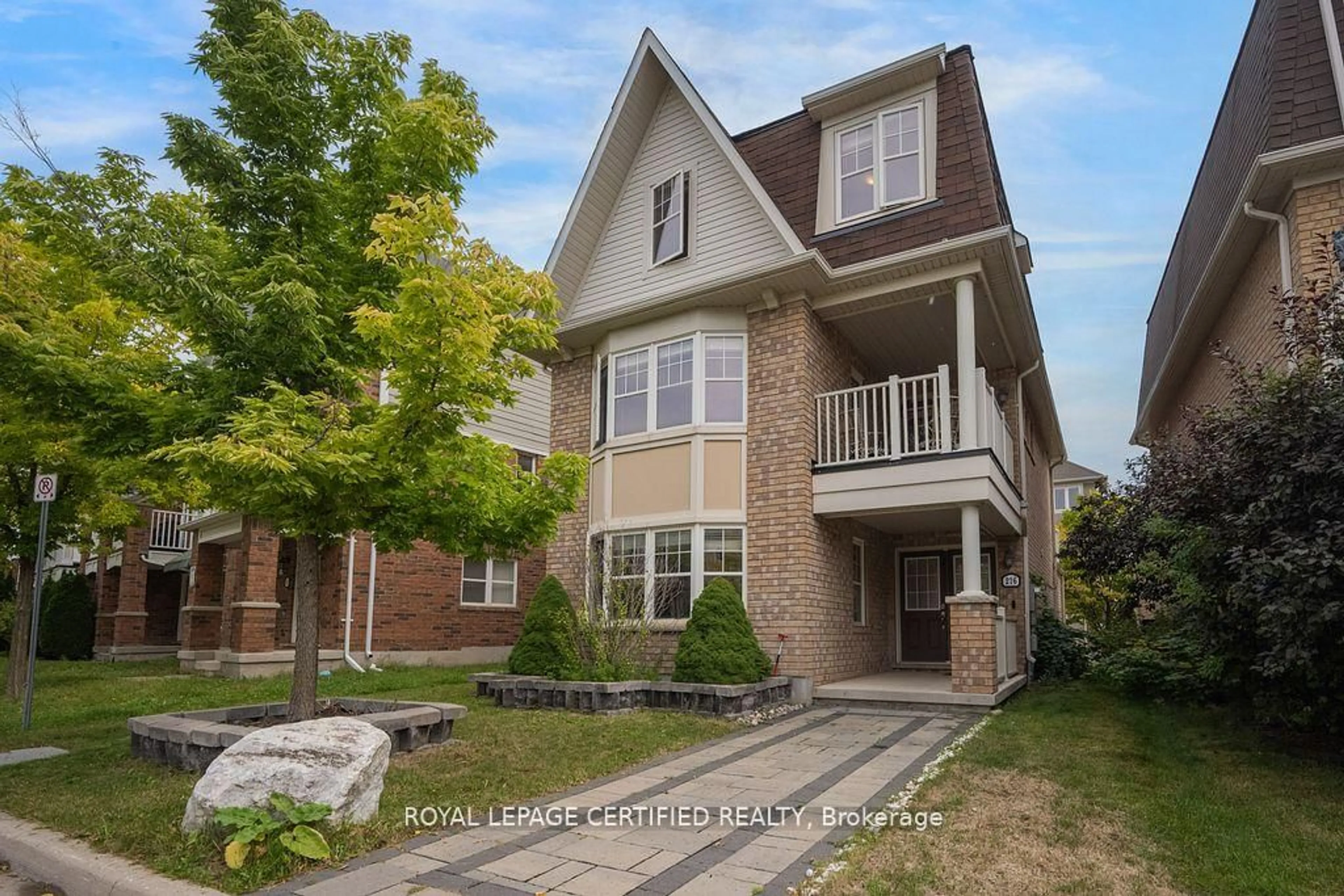 Home with brick exterior material, street for 216 Magurn Gate, Milton Ontario L9T 7B4