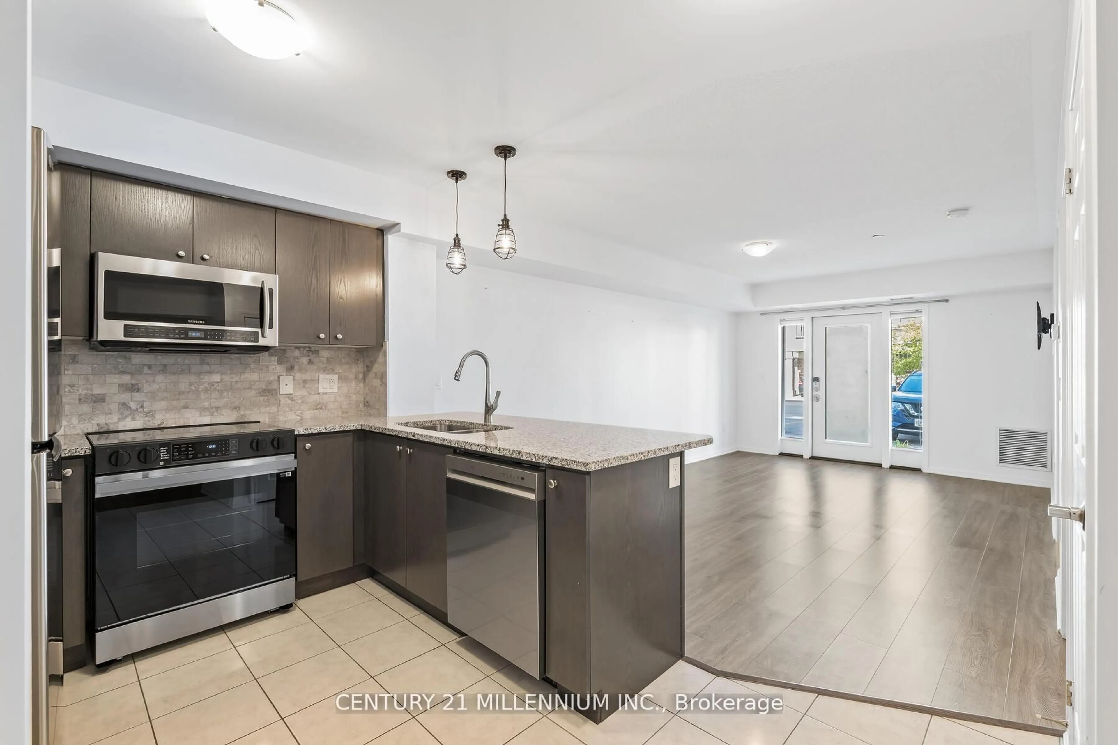 Open concept kitchen, ceramic/tile floor for 1045 Nadalin Hts #111, Milton Ontario L9T 8R5