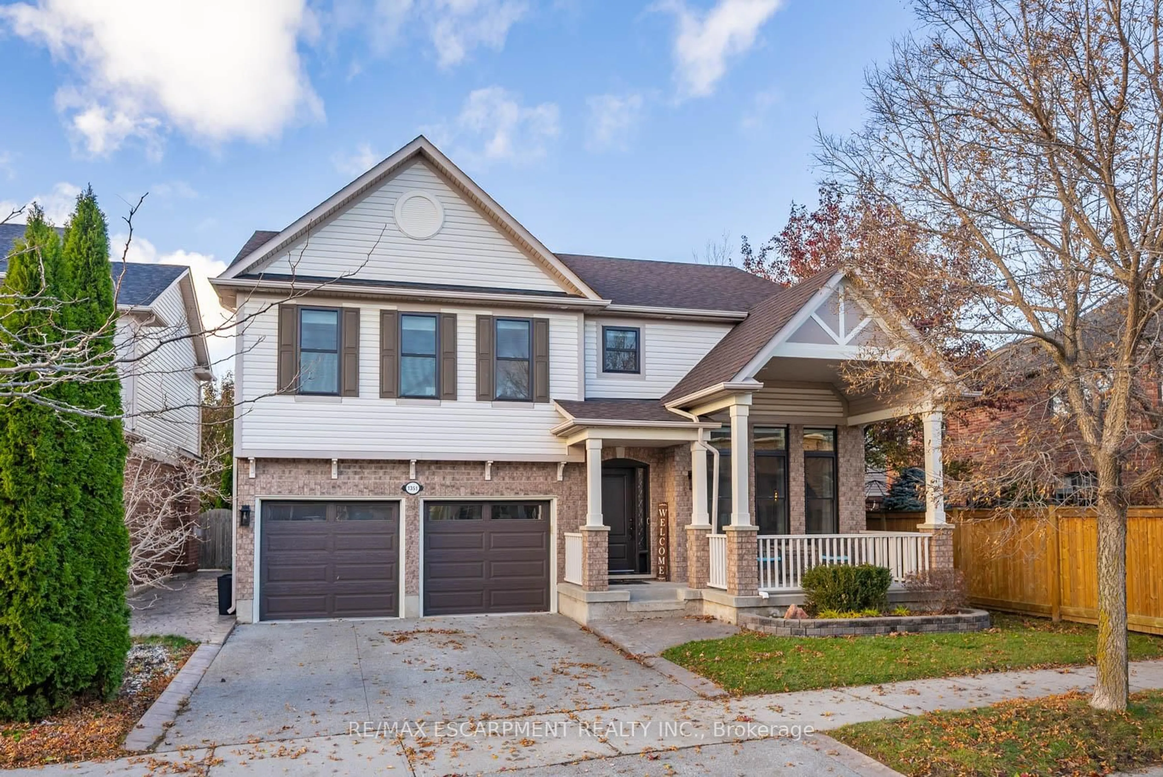 Home with brick exterior material, street for 1351 McGuffin Gate, Milton Ontario L9T 6M3